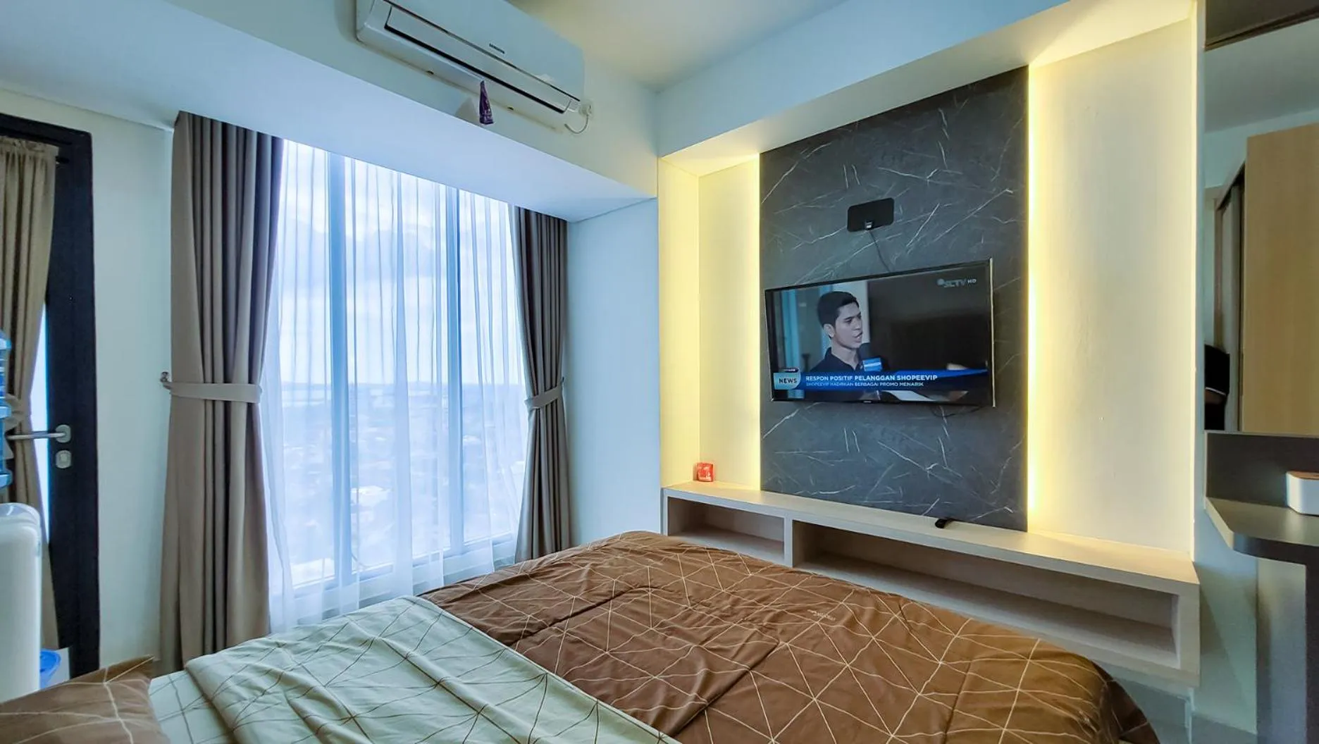 Bed in Palam Mansion at Meisterstadt Pollux Habibie Apartment