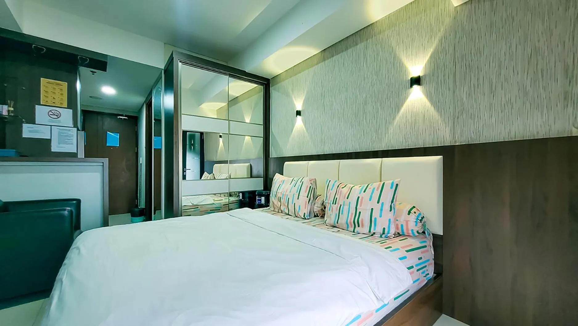 Bed in Palam Mansion at Meisterstadt Pollux Habibie Apartment