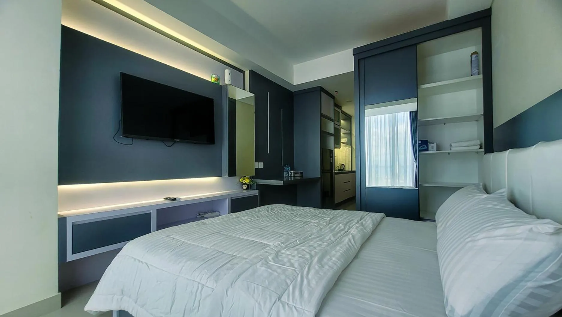 Bed in Palam Mansion at Meisterstadt Pollux Habibie Apartment