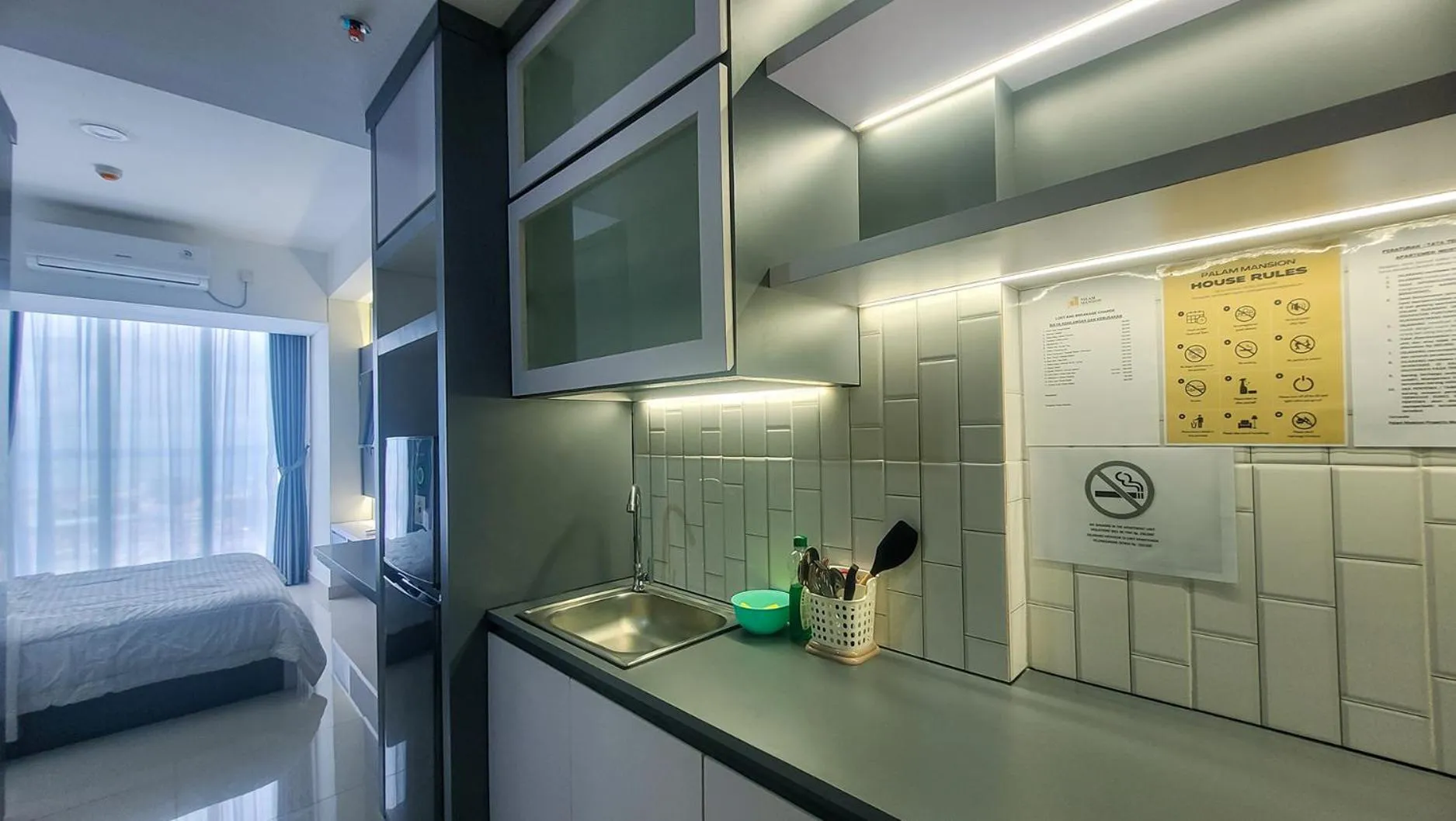 Kitchen or kitchenette, Bed in Palam Mansion at Meisterstadt Pollux Habibie Apartment
