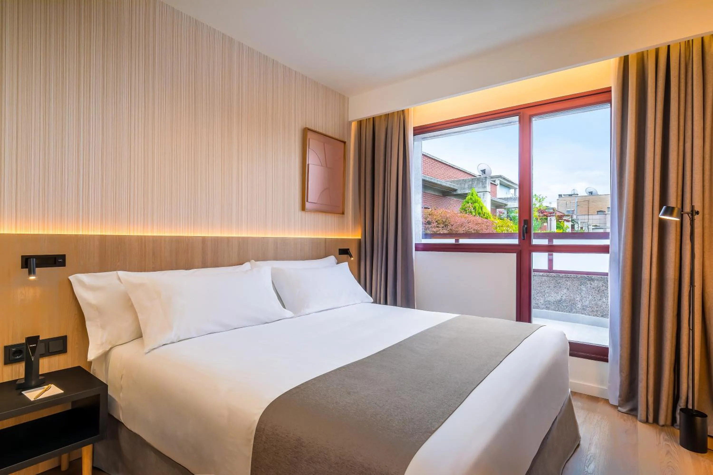 Photo of the whole room, Bed in Occidental Pamplona