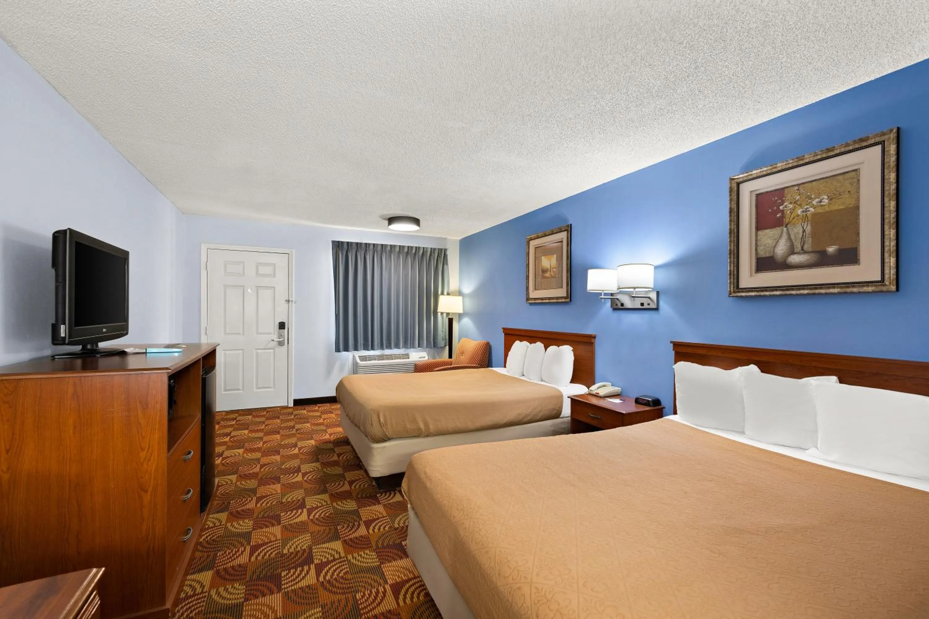 Bed in Americas Best Value Inn-Celina