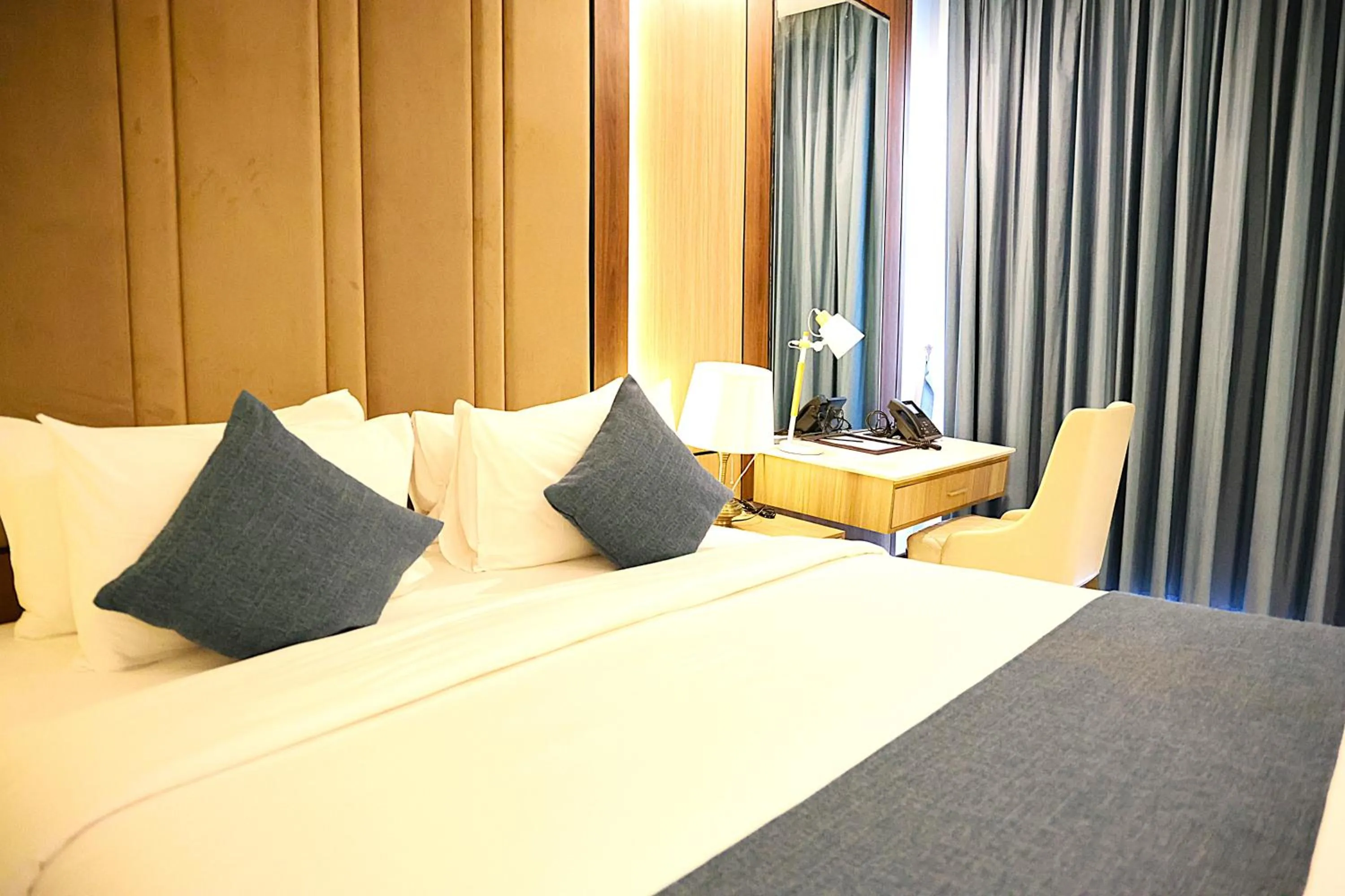 Bed in Castle Bayview Resort & Spa