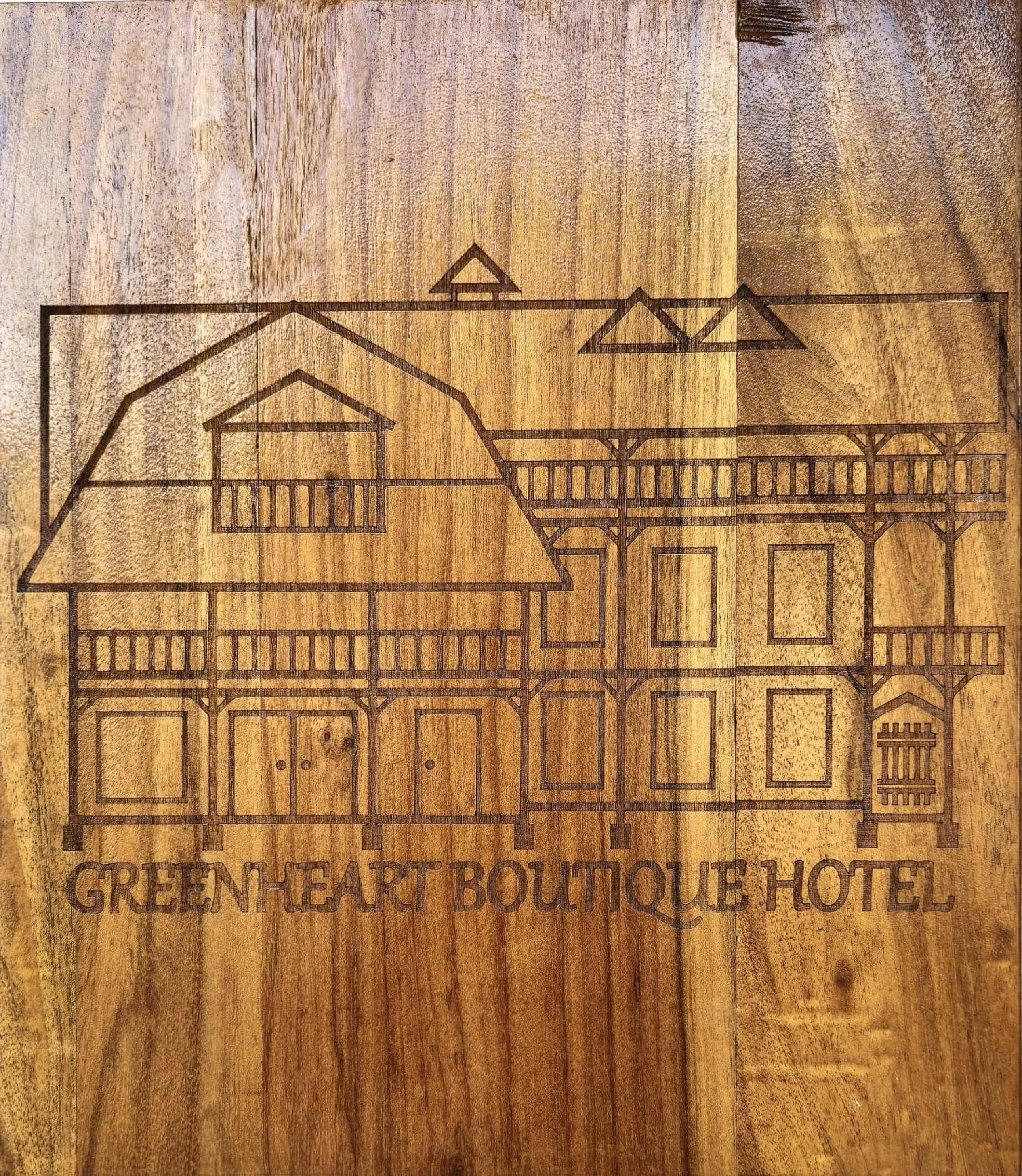 Property logo or sign in Greenheart Boutique Hotel
