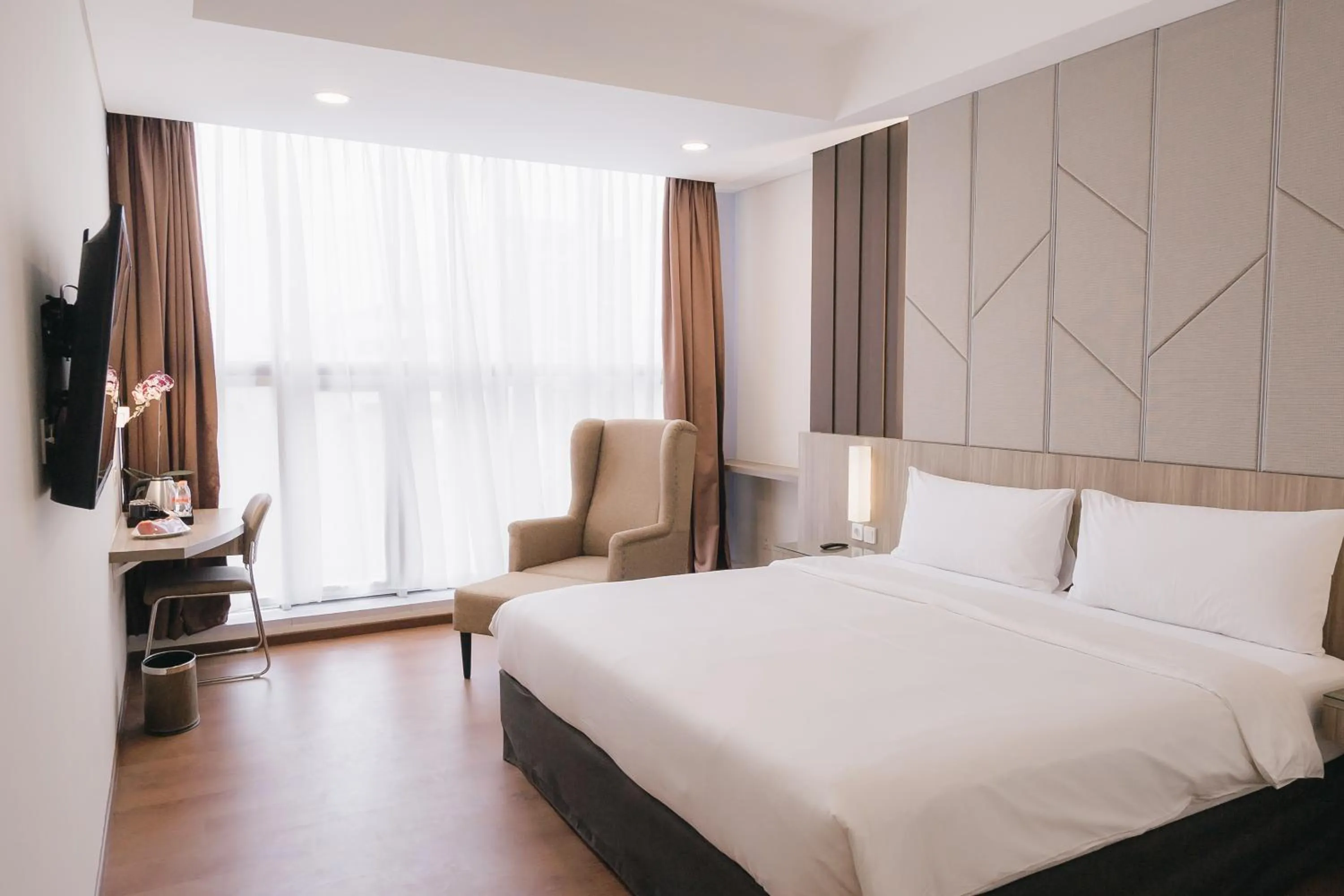 Bed in Grand G7 Hotel Pasar baru