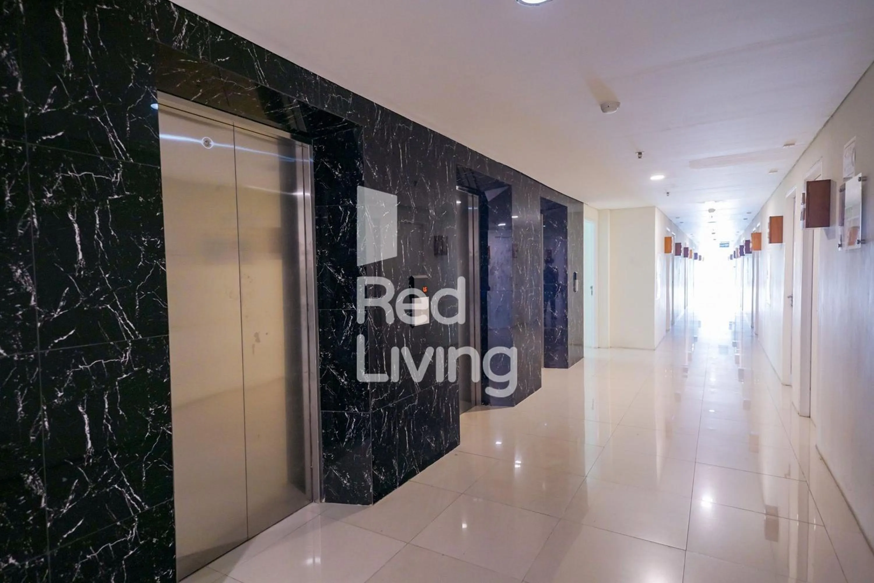 elevator in RedLiving Apartemen Bogorienze Resort - Skyland Tower A