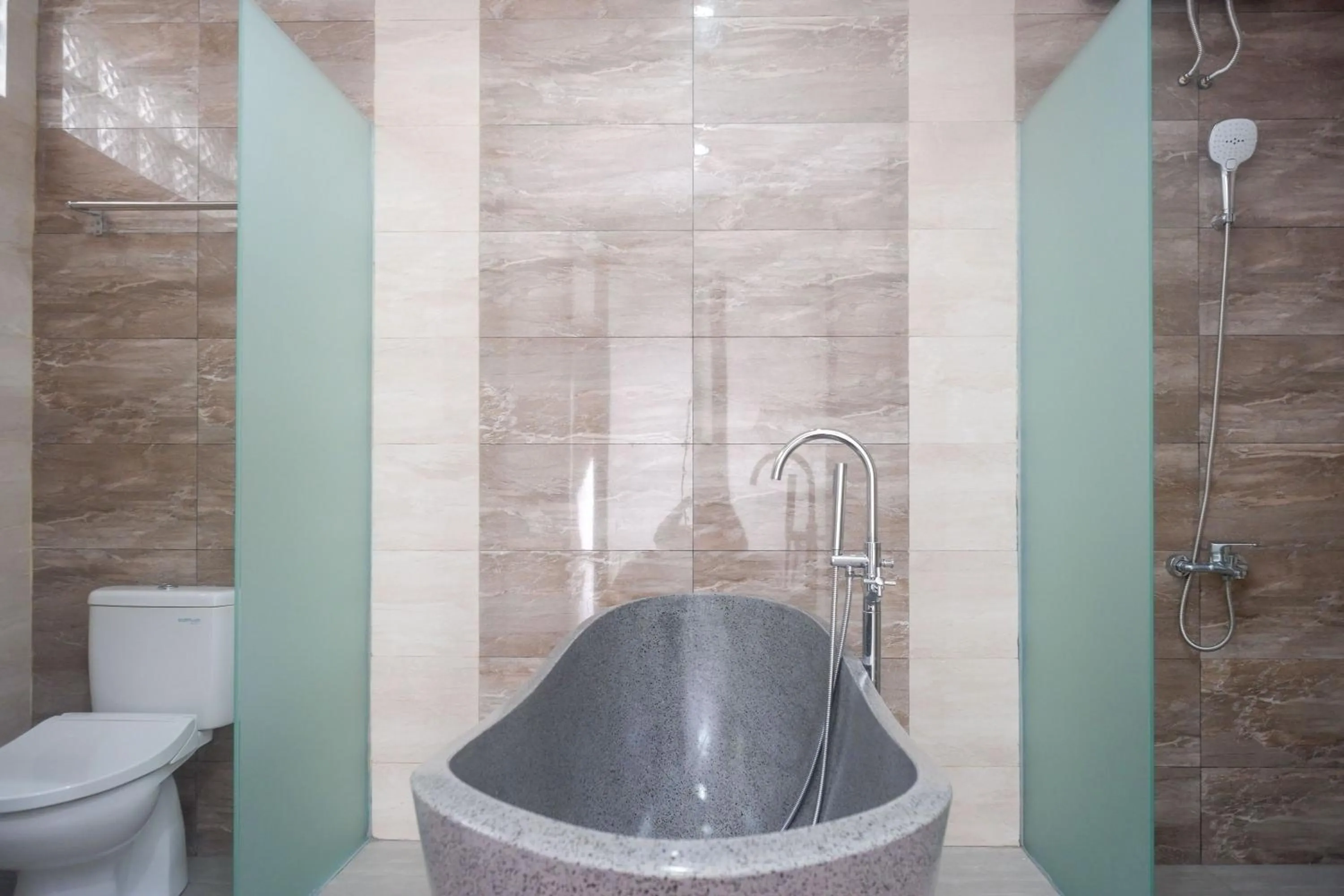 Bathroom in The Lavana Greenkhaza Villa Jogja