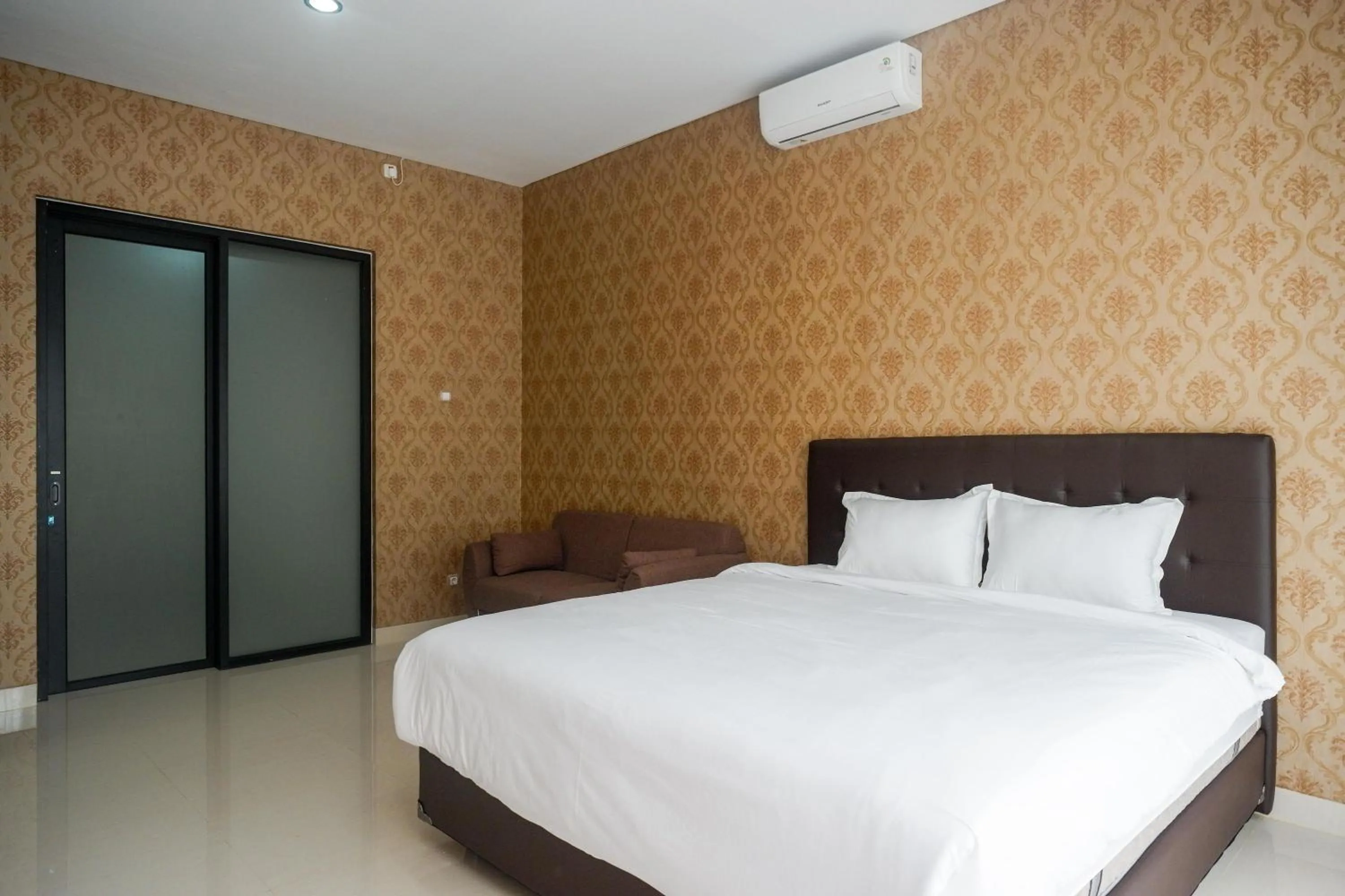 Bedroom, Bed in The Lavana Greenkhaza Villa Jogja