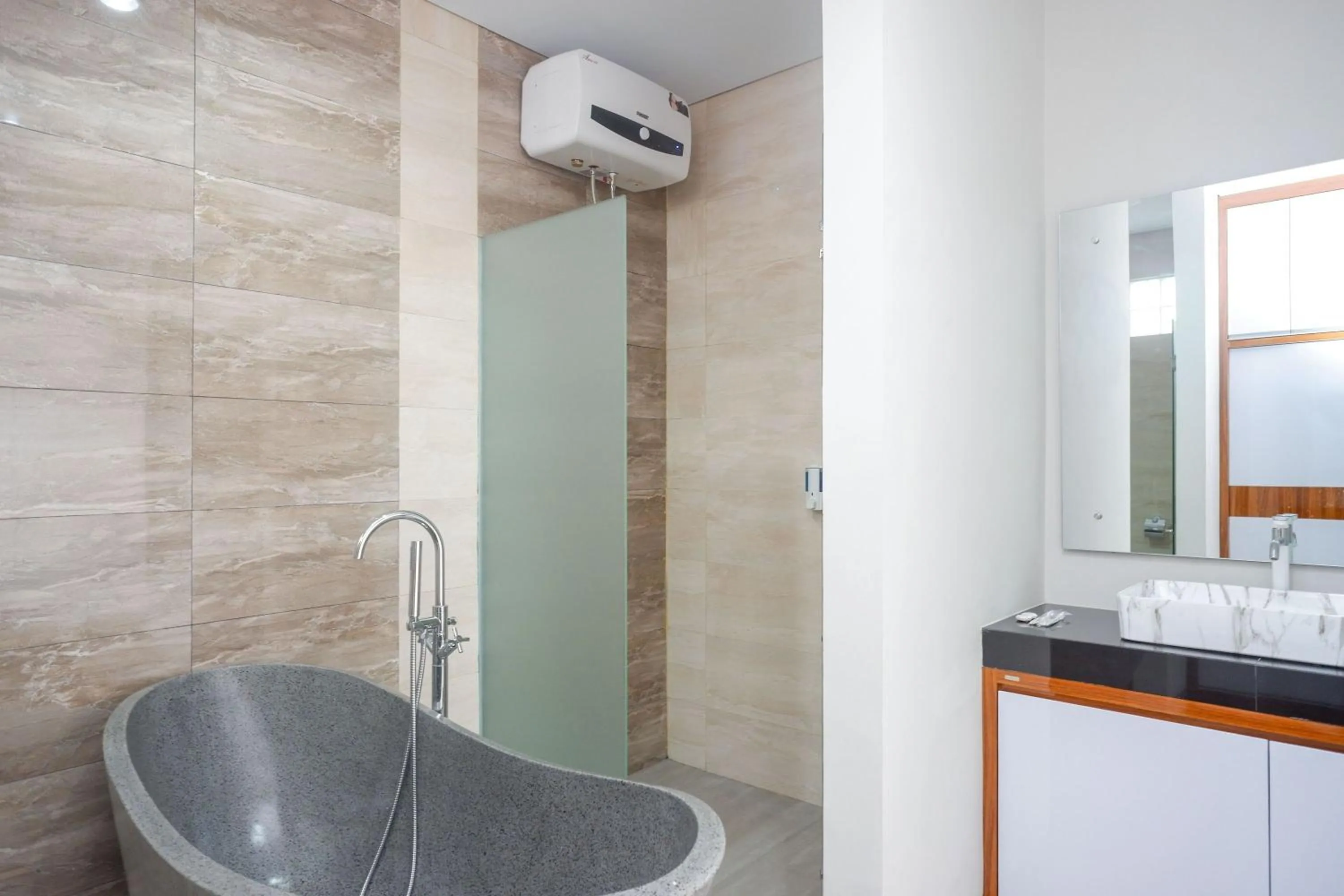 Bathroom in The Lavana Greenkhaza Villa Jogja