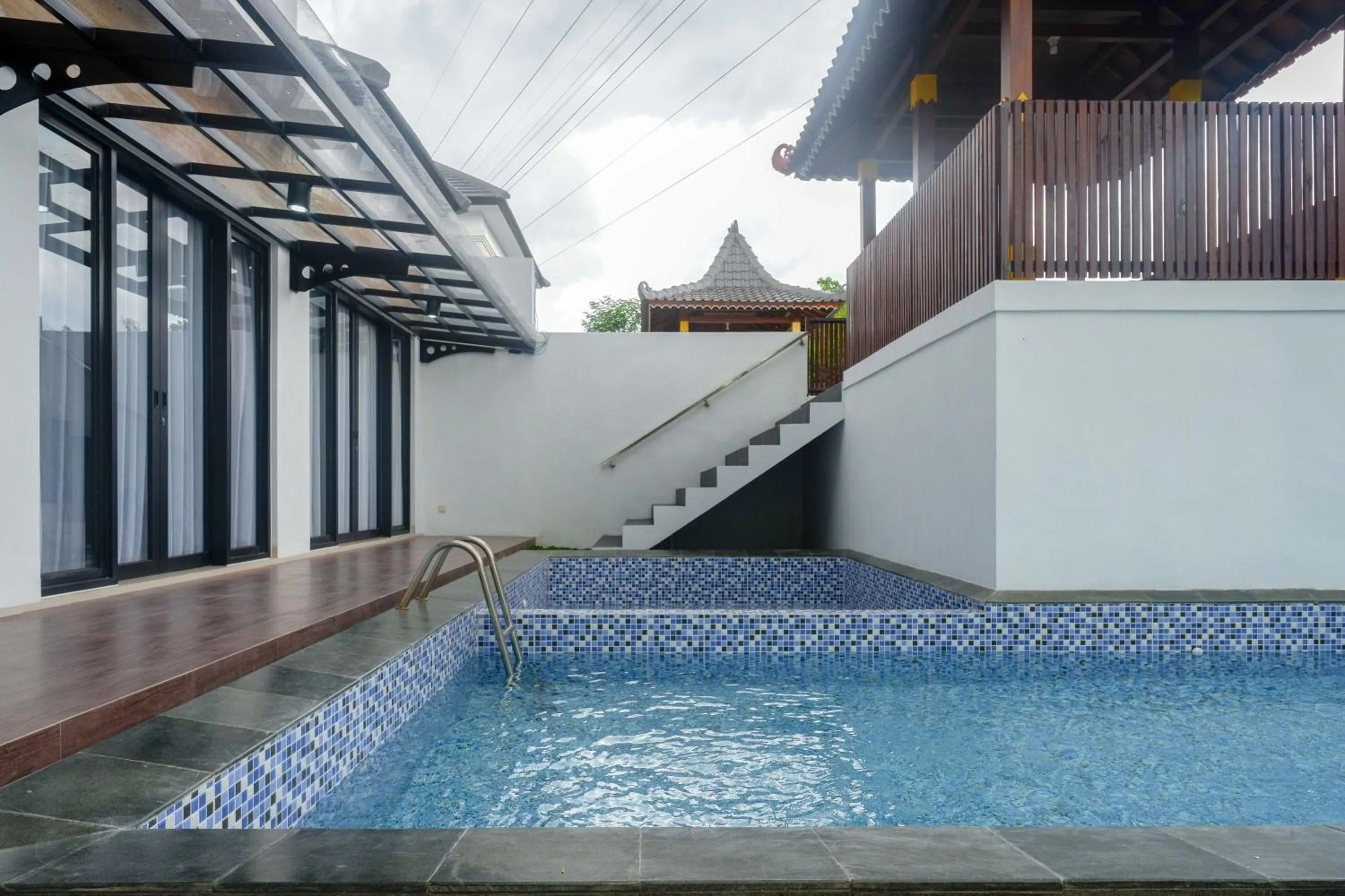 Swimming pool in The Lavana Greenkhaza Villa Jogja