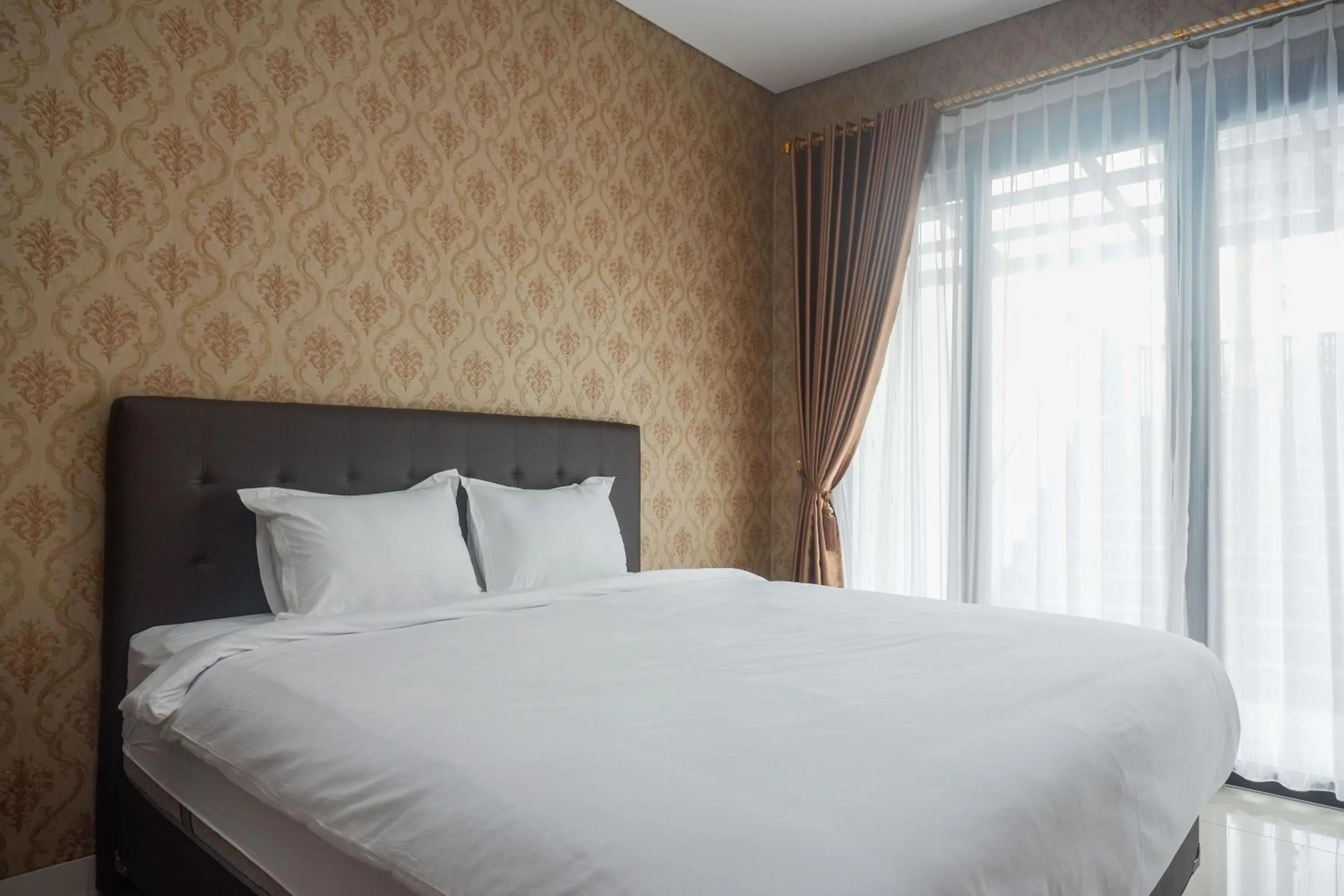 Bedroom, Bed in The Lavana Greenkhaza Villa Jogja