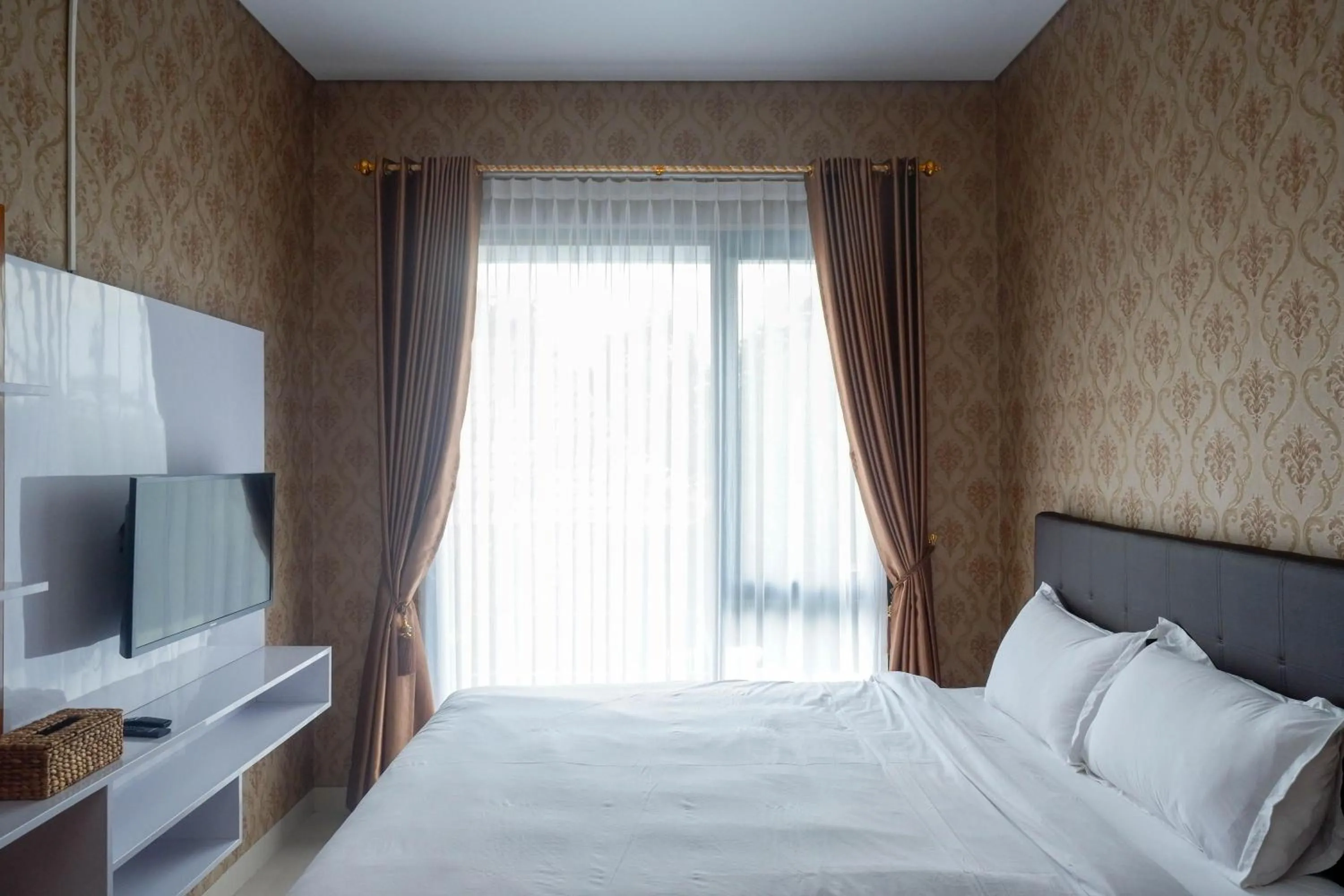 Bedroom, Bed in The Lavana Greenkhaza Villa Jogja