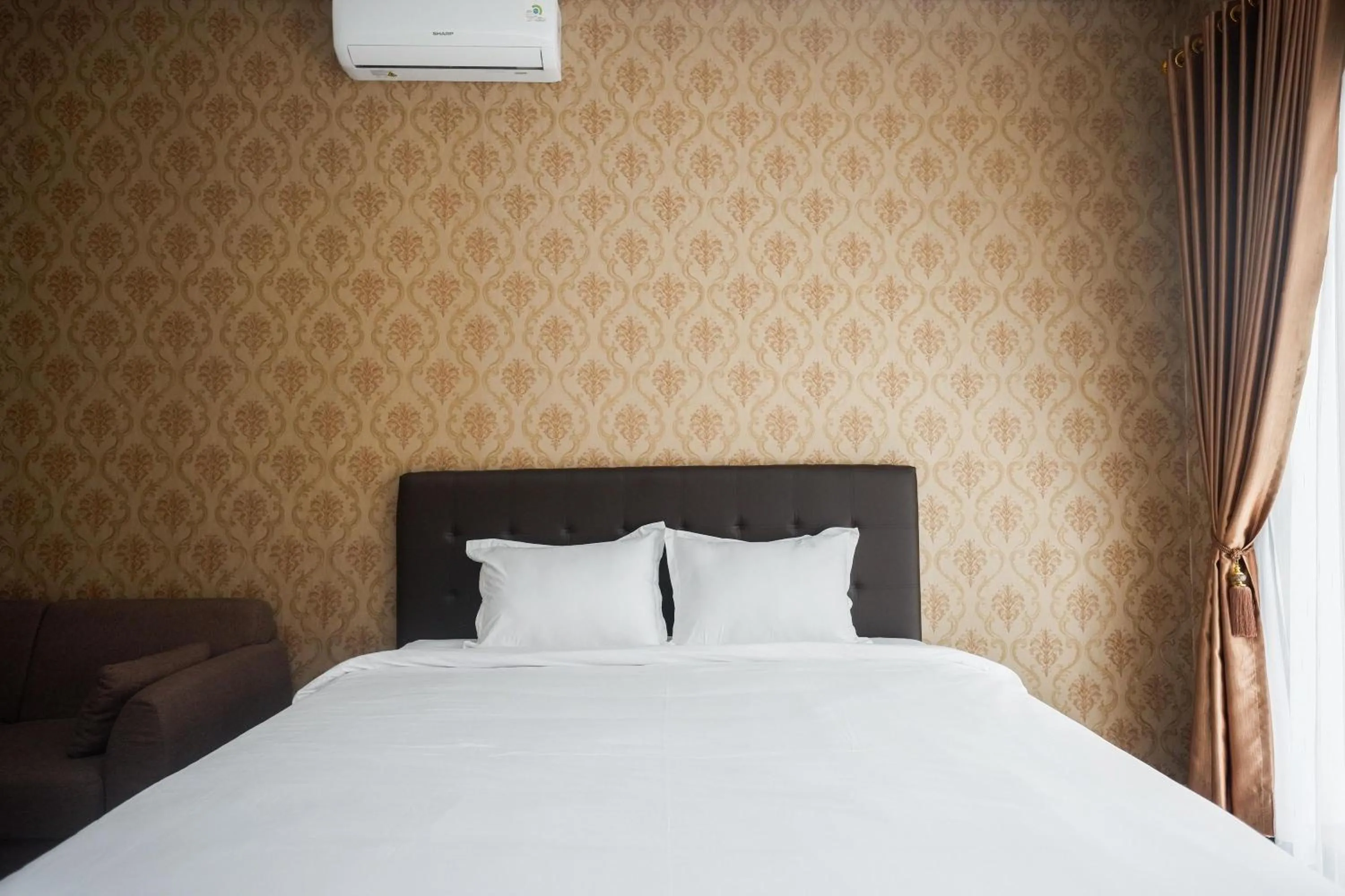 Bedroom, Bed in The Lavana Greenkhaza Villa Jogja