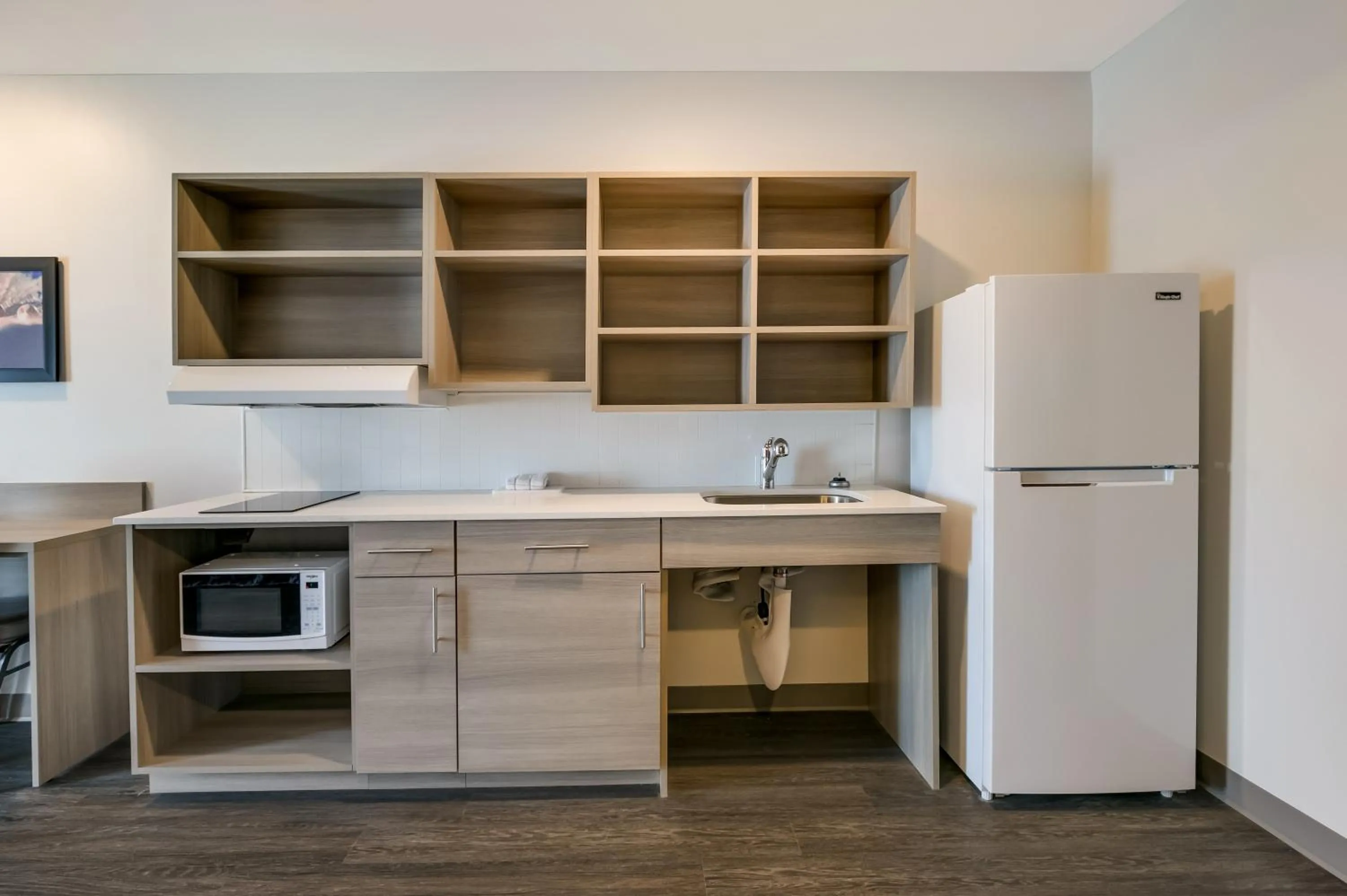 Kitchen or kitchenette in WoodSpring Suites Jacksonville Orange Park
