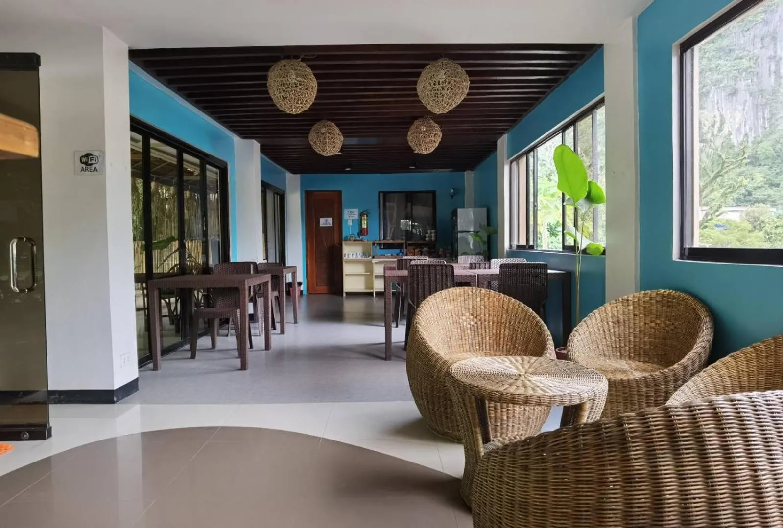 Seating area in Amos Pili Tree Inn powered by Cocotel