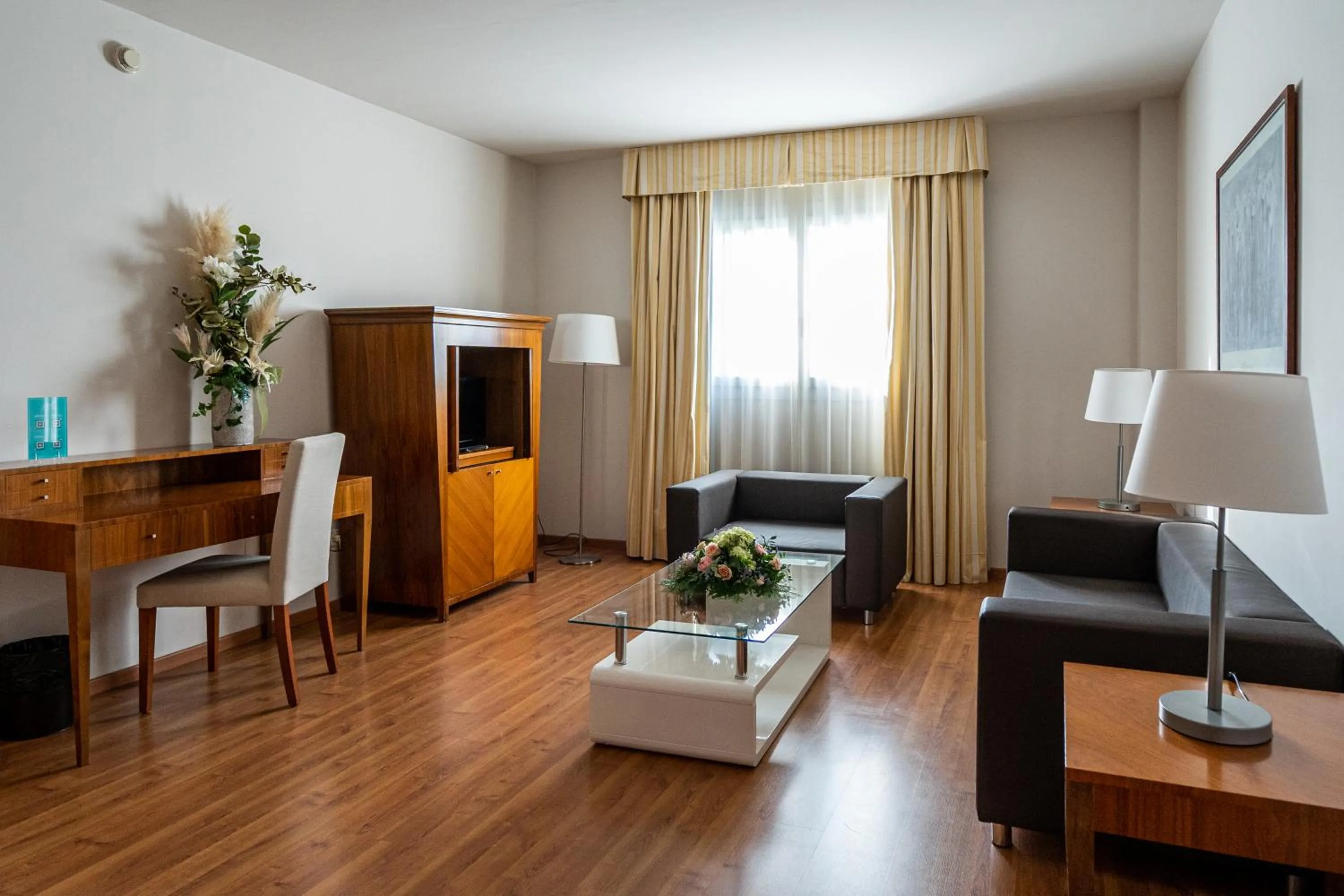 Seating area in Avenida Hotel