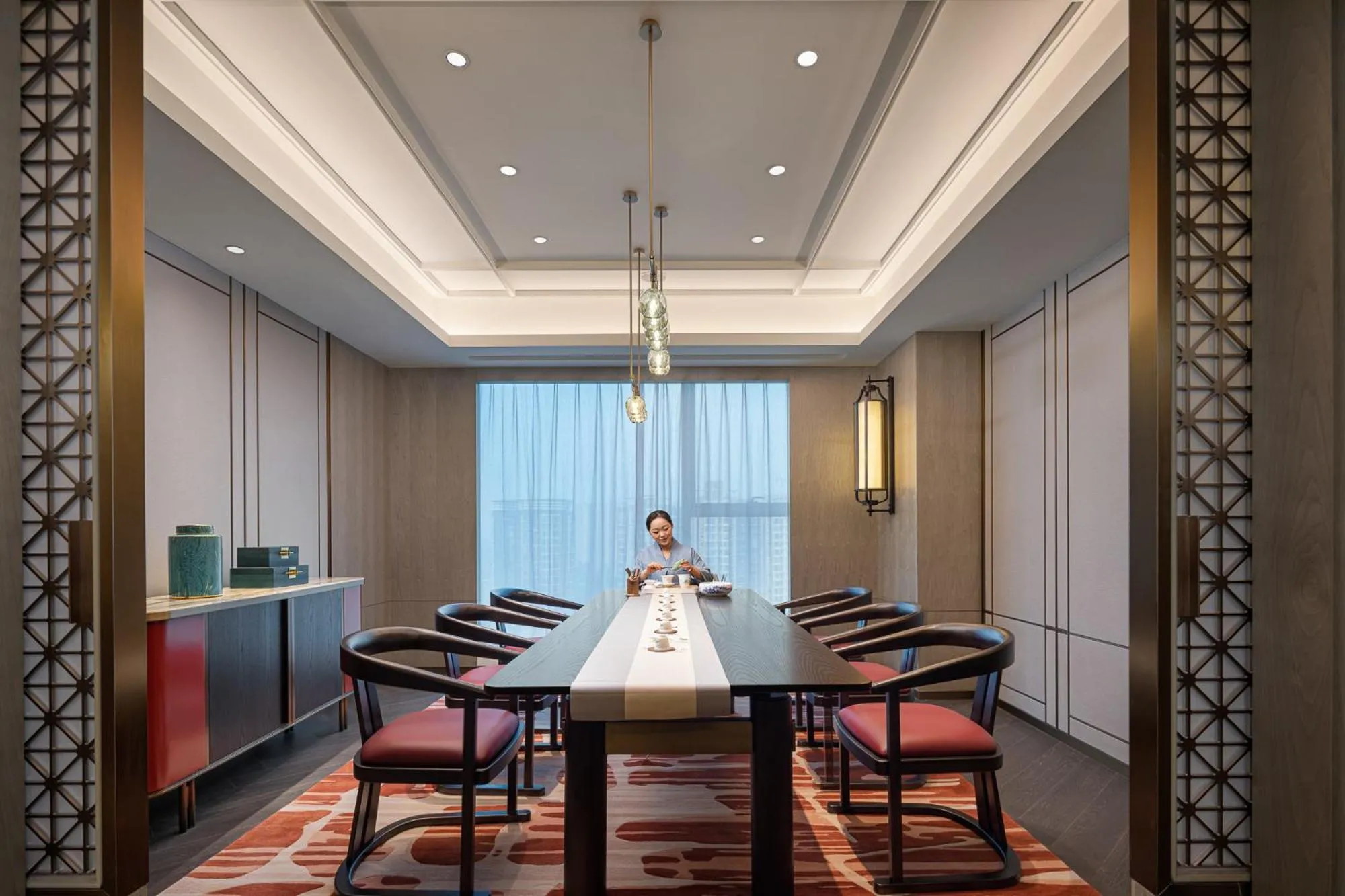 Seating area in Hualuxe Leshan, an IHG Hotel