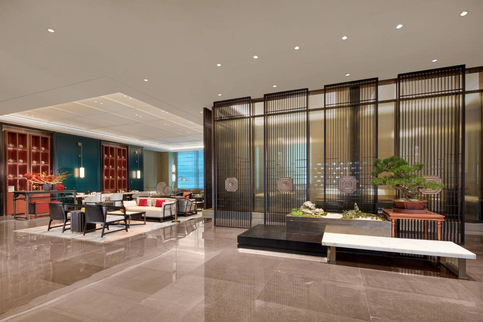 Seating area in Hualuxe Leshan, an IHG Hotel