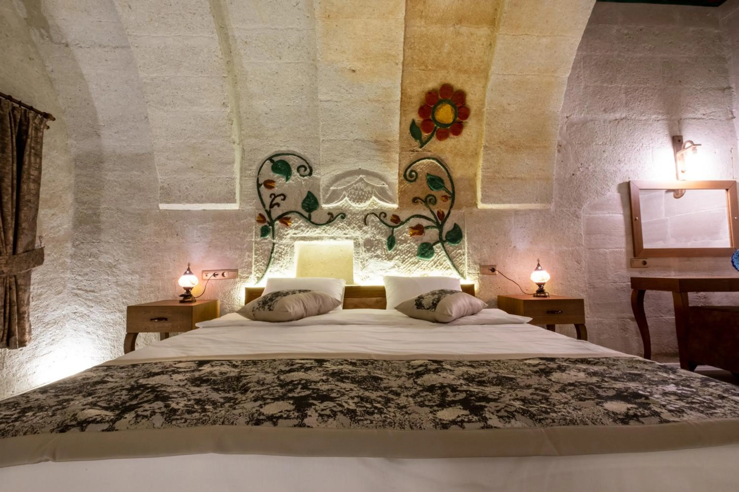 Bed in Mesken Cave Suites