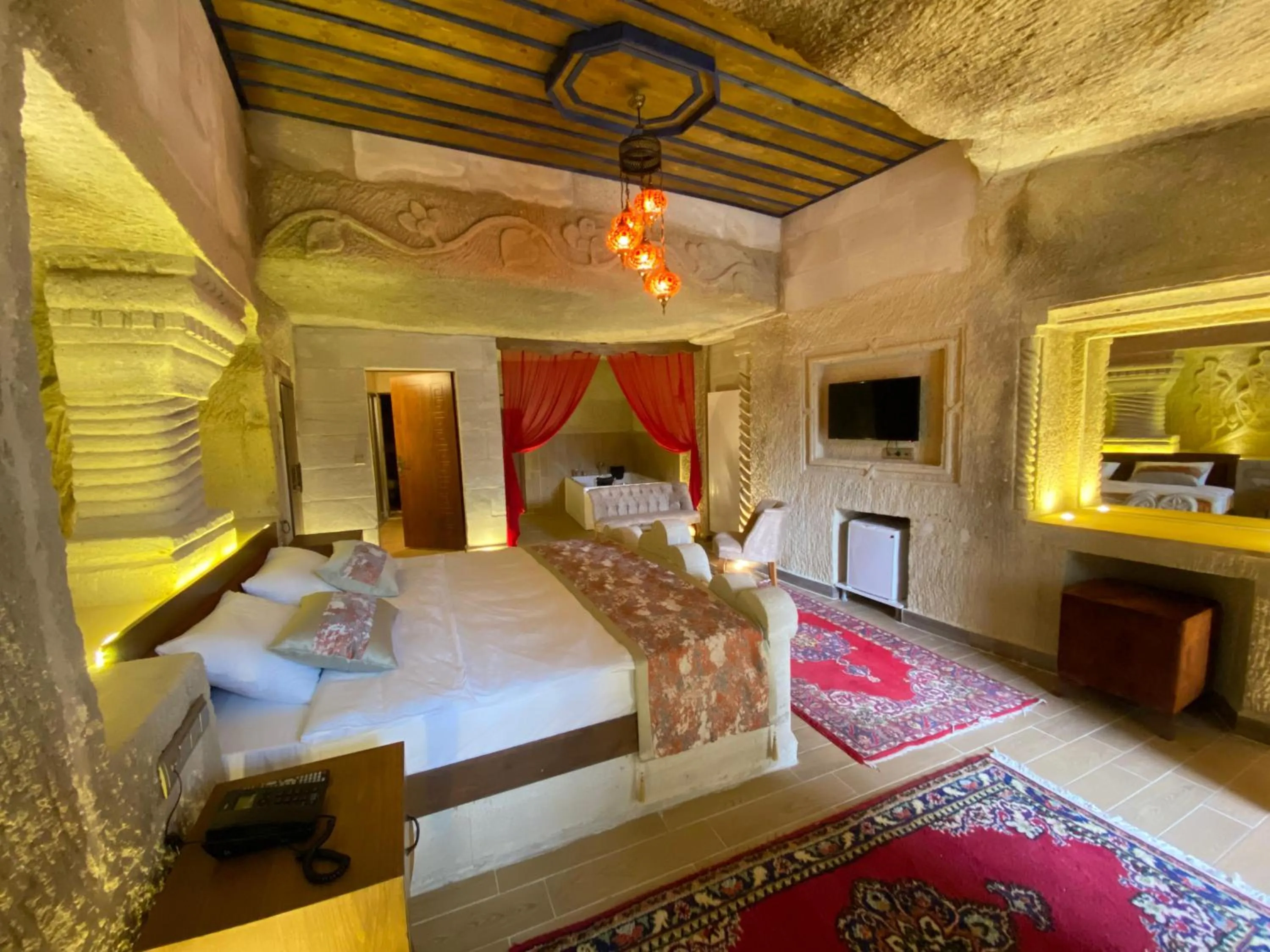 Bed in Mesken Cave Suites