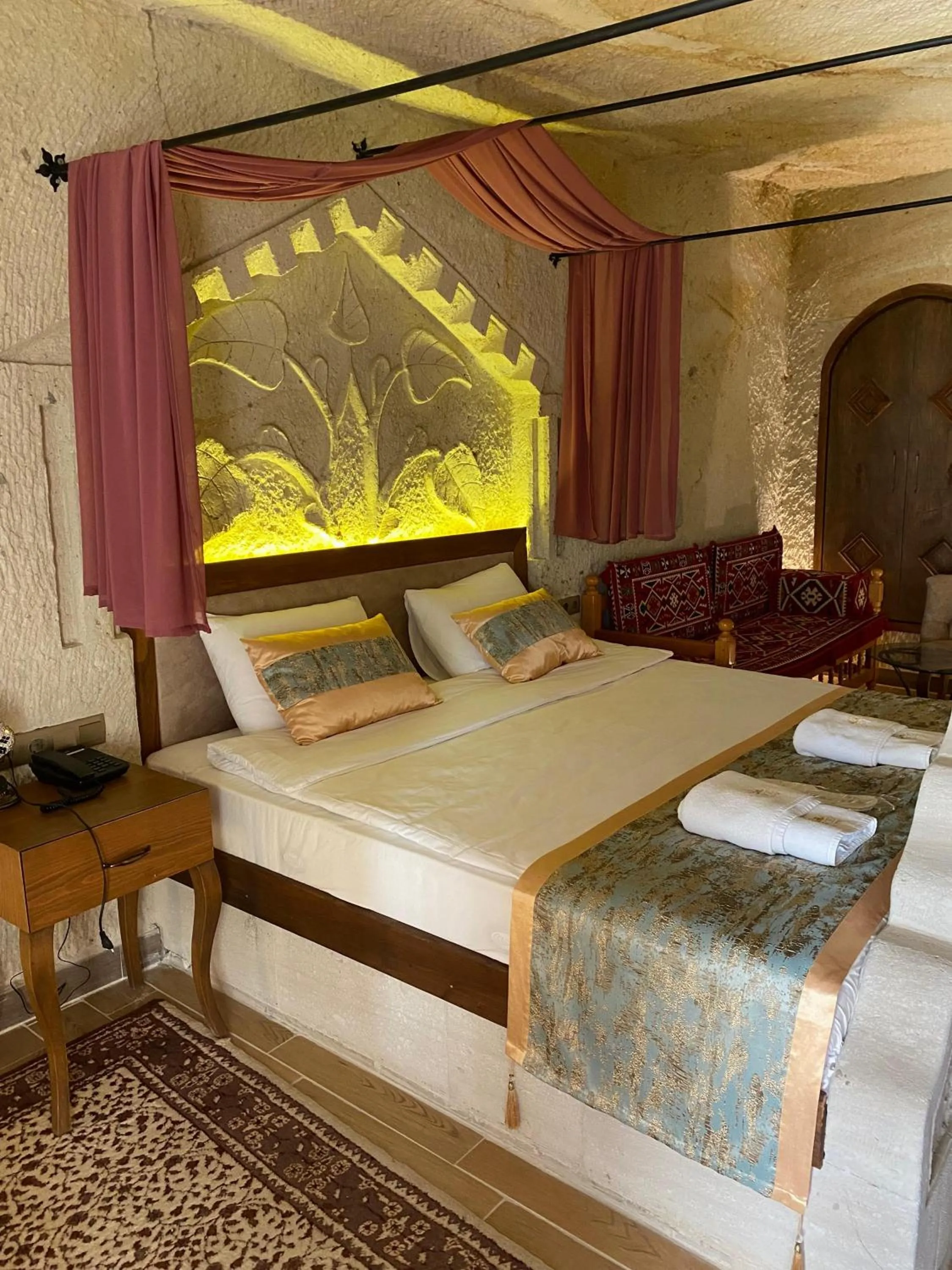Bed in Mesken Cave Suites