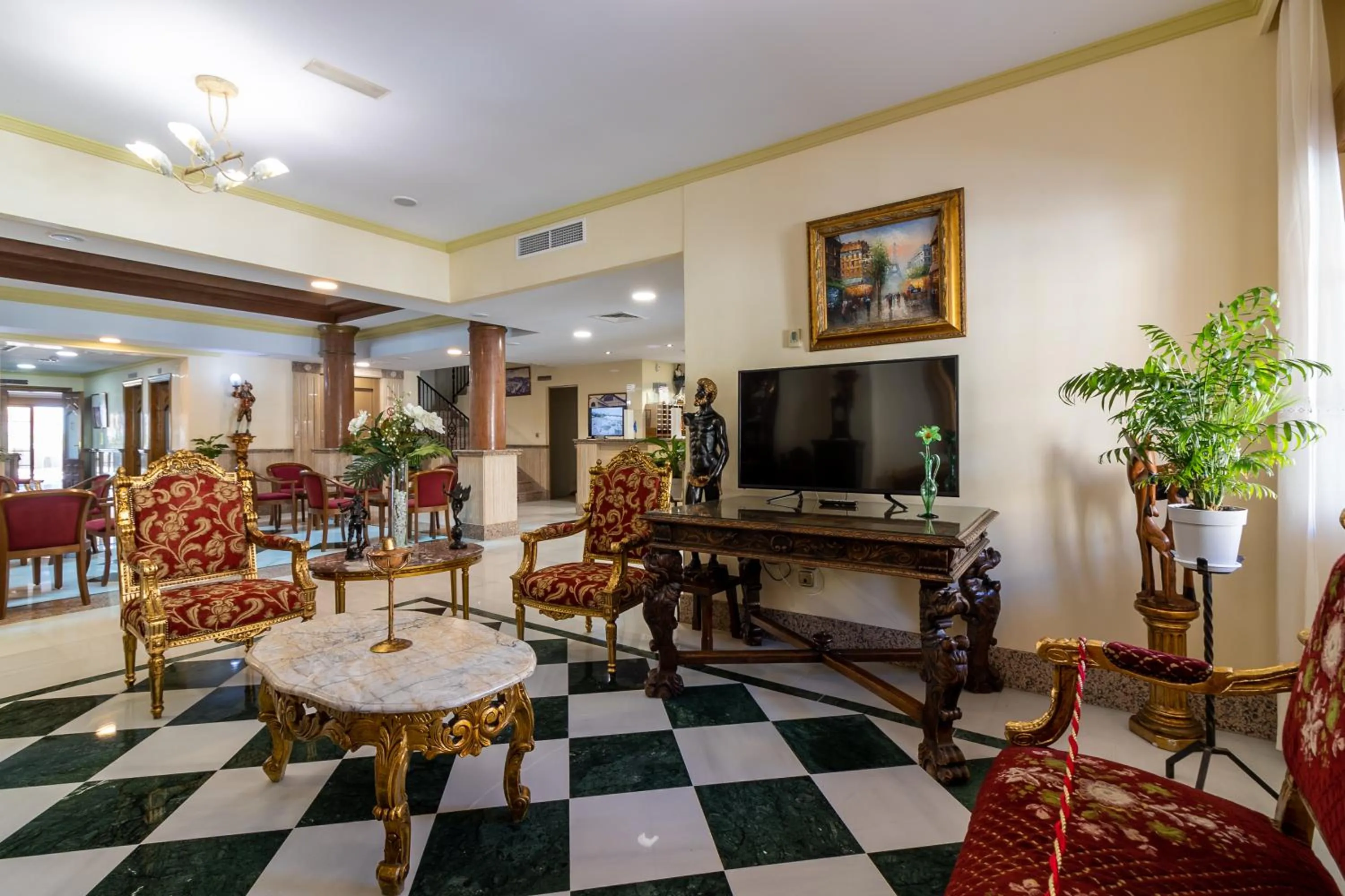 Communal lounge/ TV room in Hotel Avenida Tropical by Bossh! Hotels