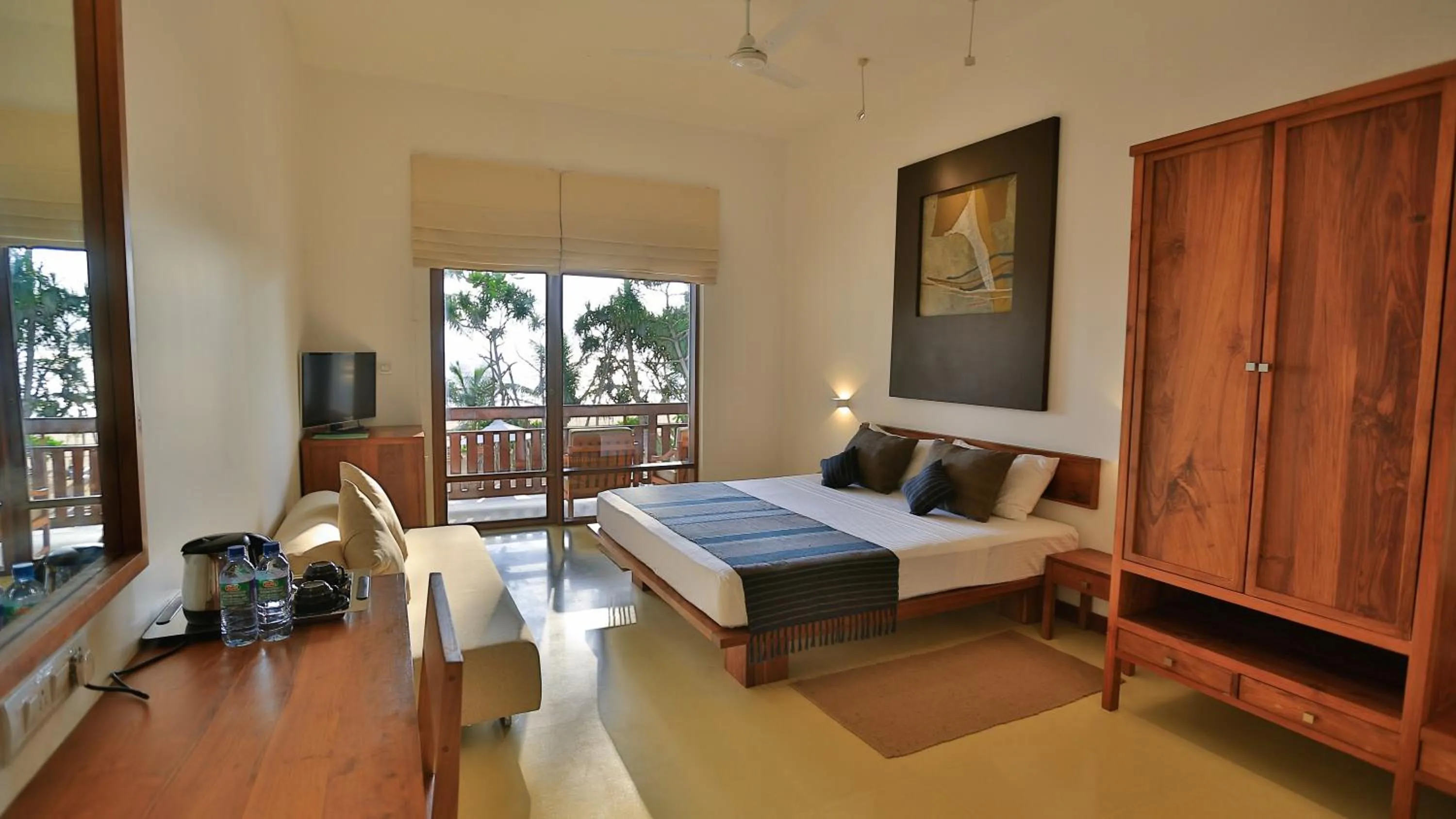 Bed in Pandanus Beach Resort & Spa