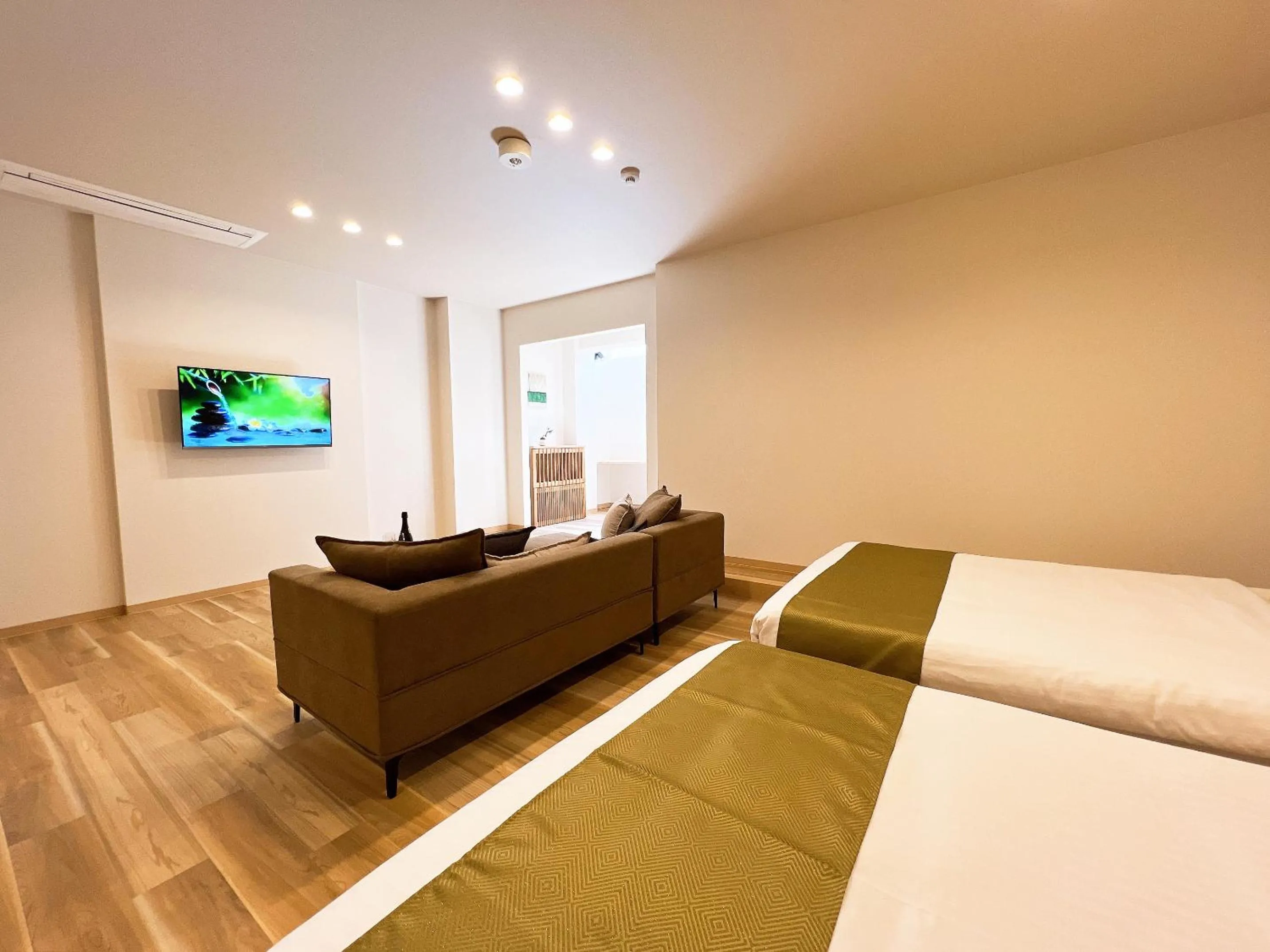 Bed in OWL RESORT ARIFUKU ONSEN