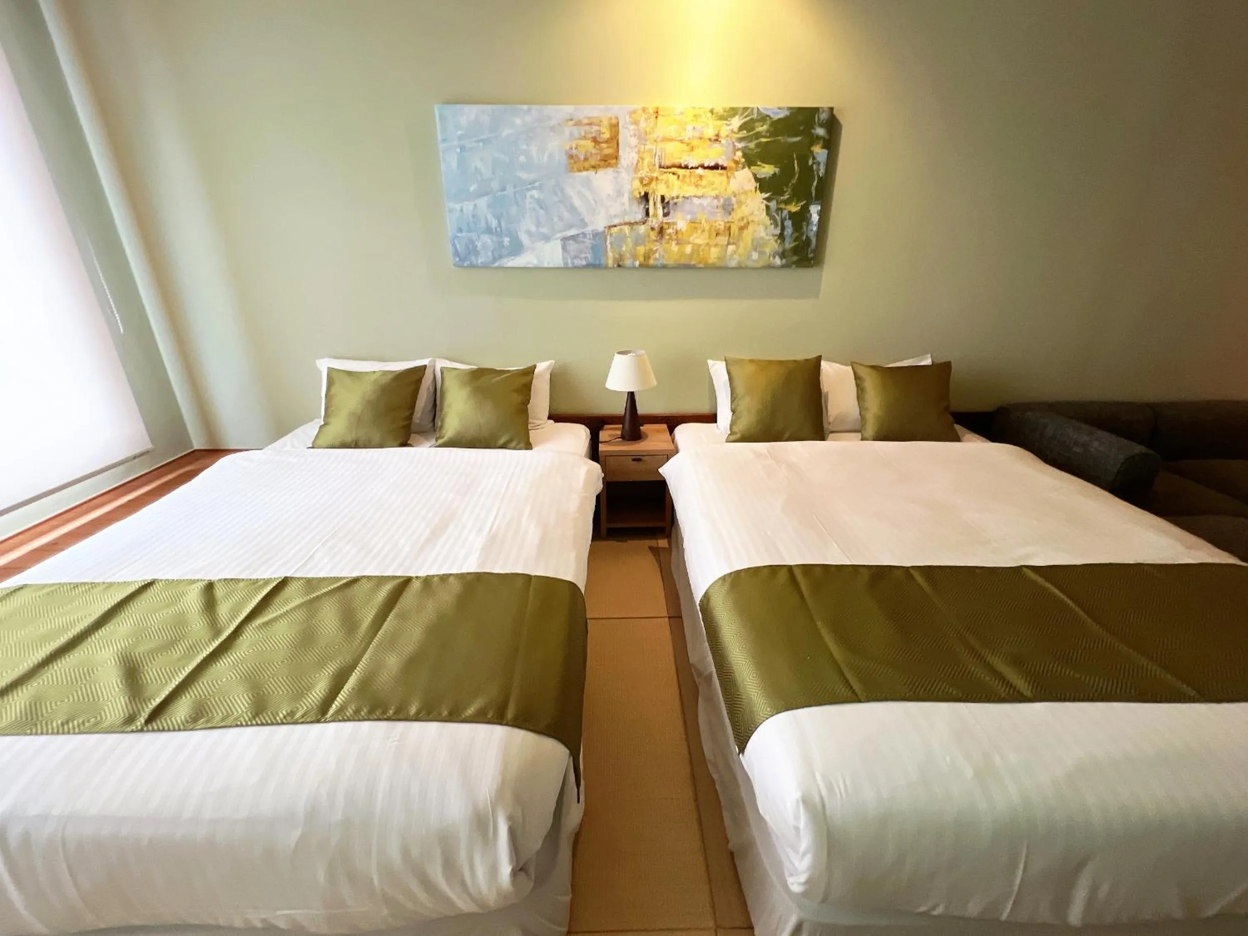 Bed in OWL RESORT ARIFUKU ONSEN