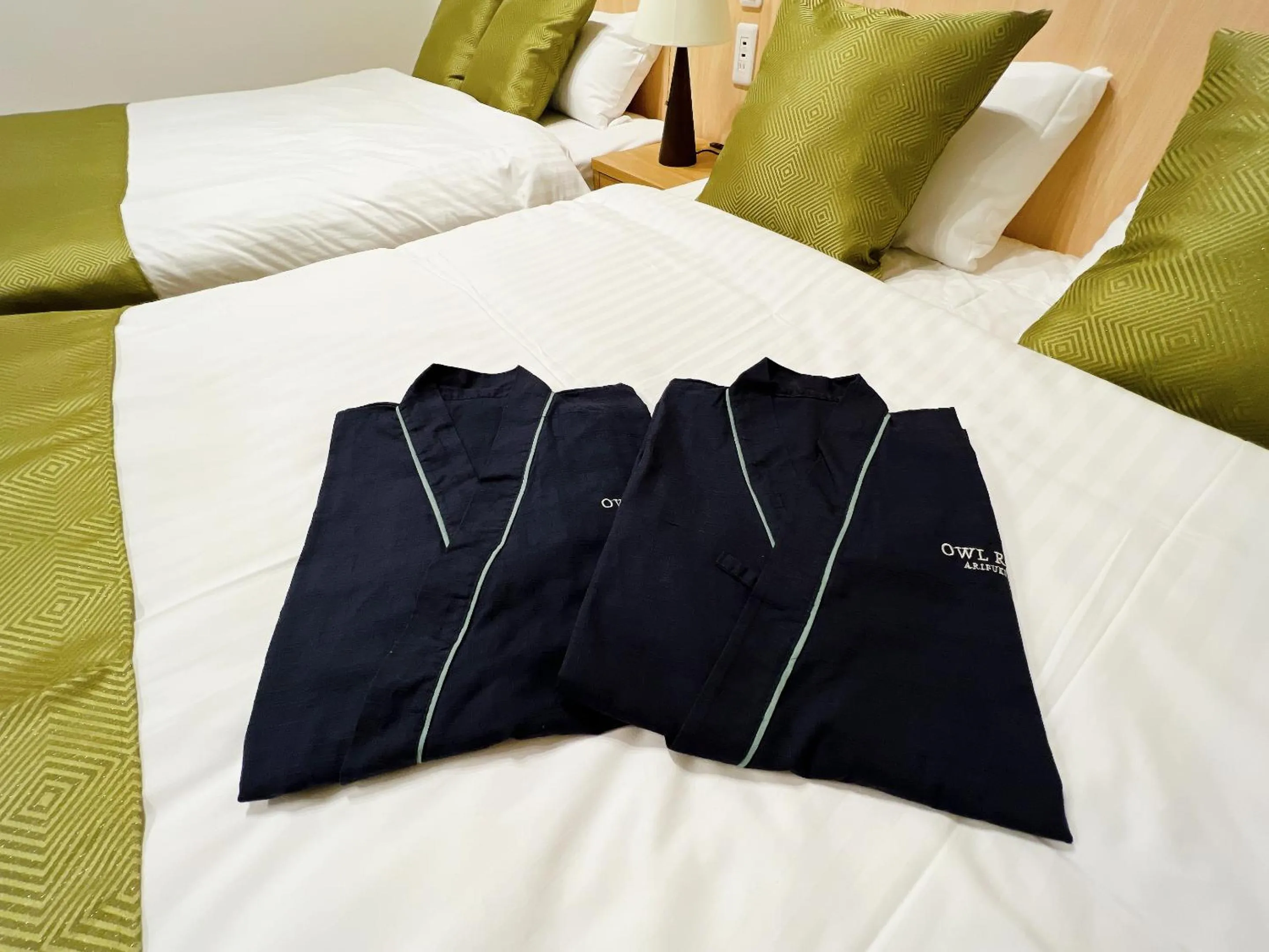 Bed in OWL RESORT ARIFUKU ONSEN