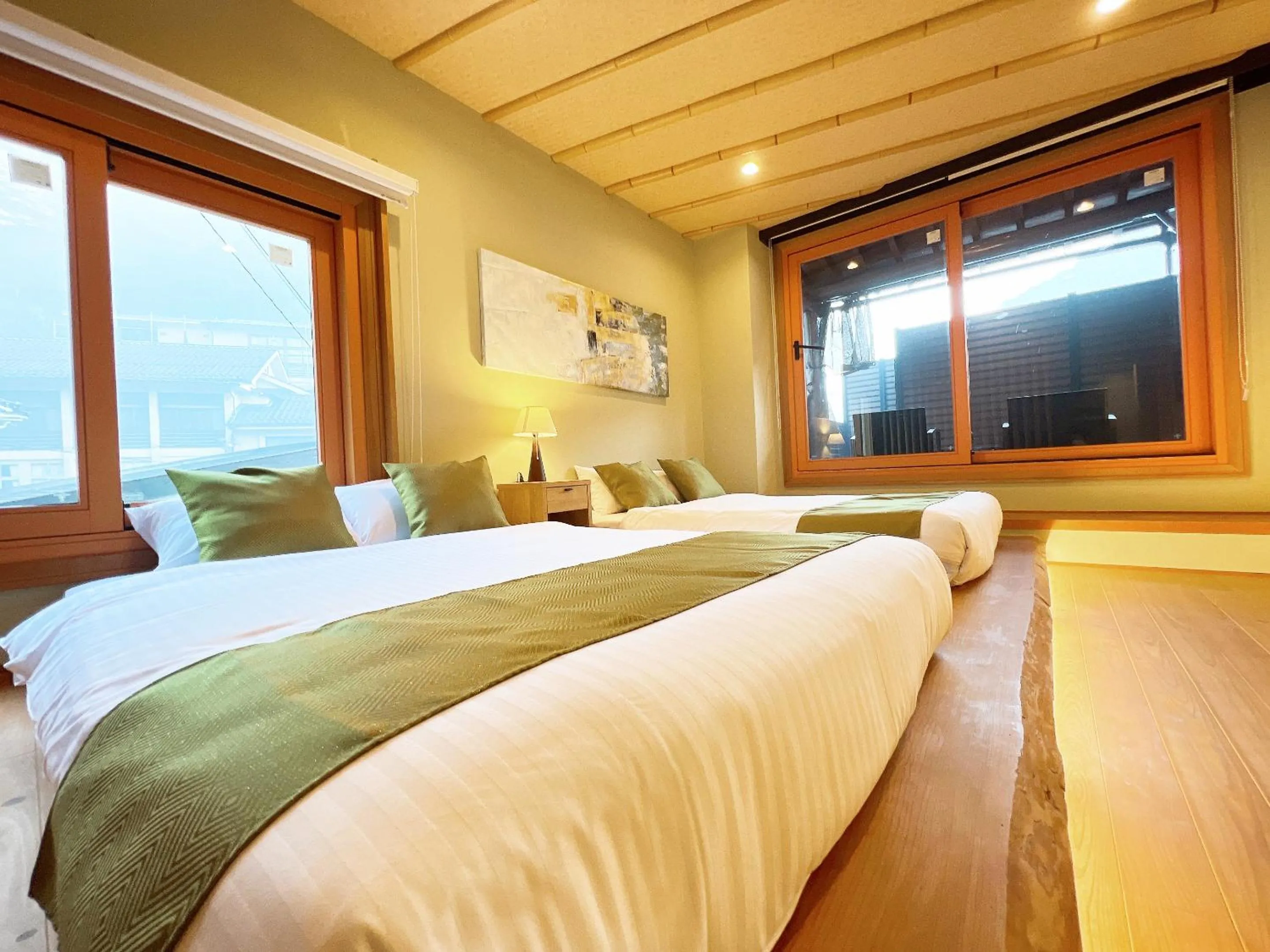 Bed in OWL RESORT ARIFUKU ONSEN