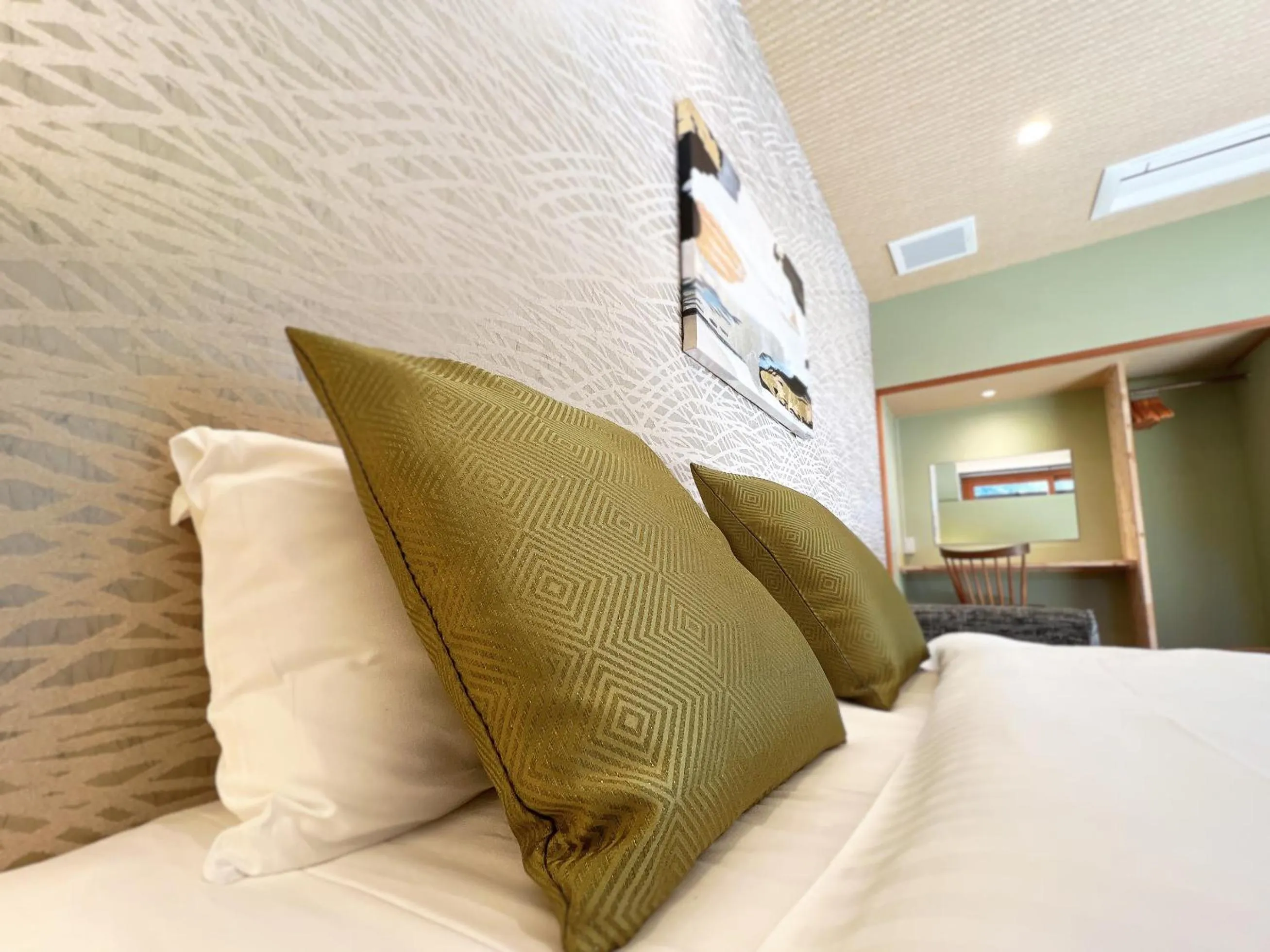 Bed in OWL RESORT ARIFUKU ONSEN