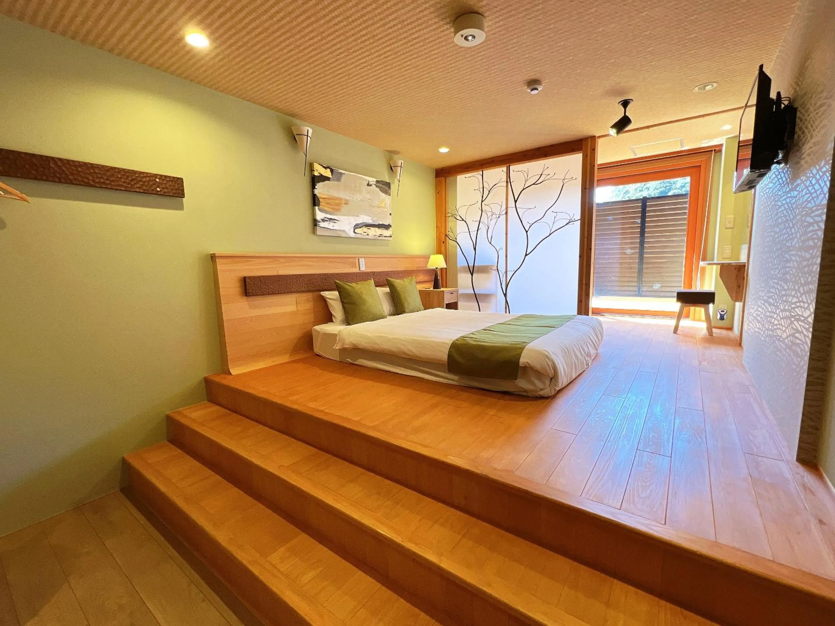 Bed in OWL RESORT ARIFUKU ONSEN