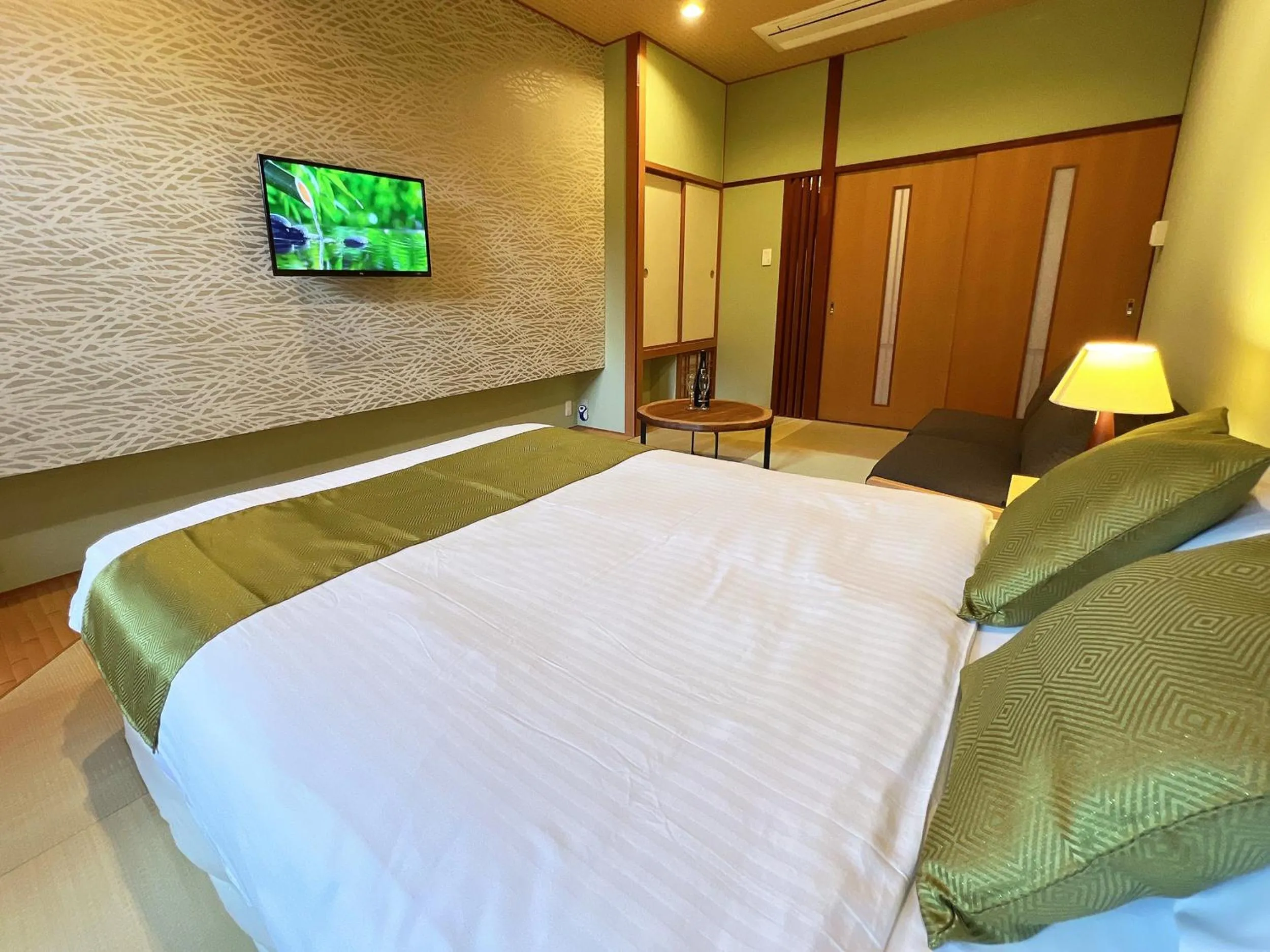 Bed in OWL RESORT ARIFUKU ONSEN