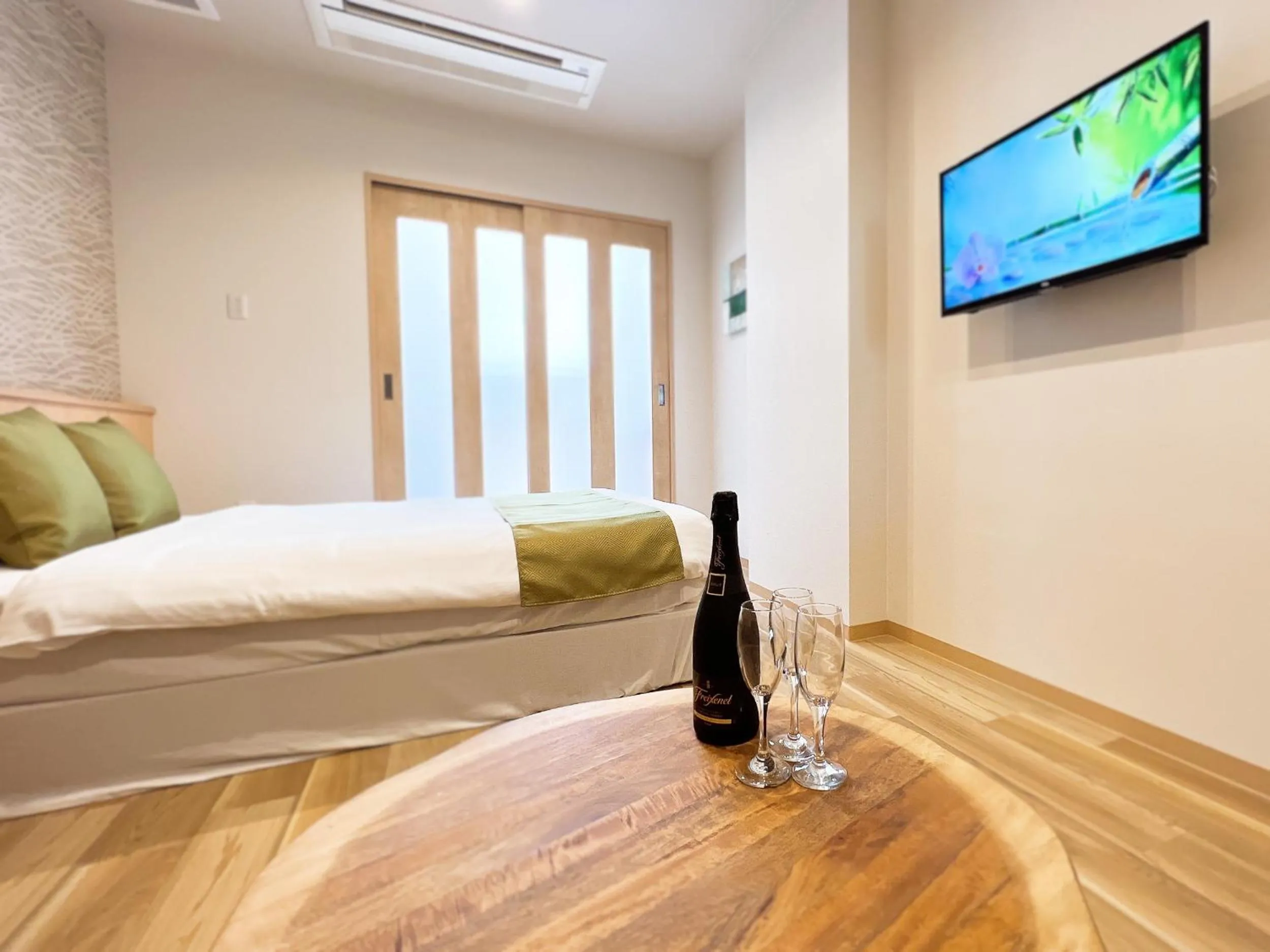 Bed in OWL RESORT ARIFUKU ONSEN