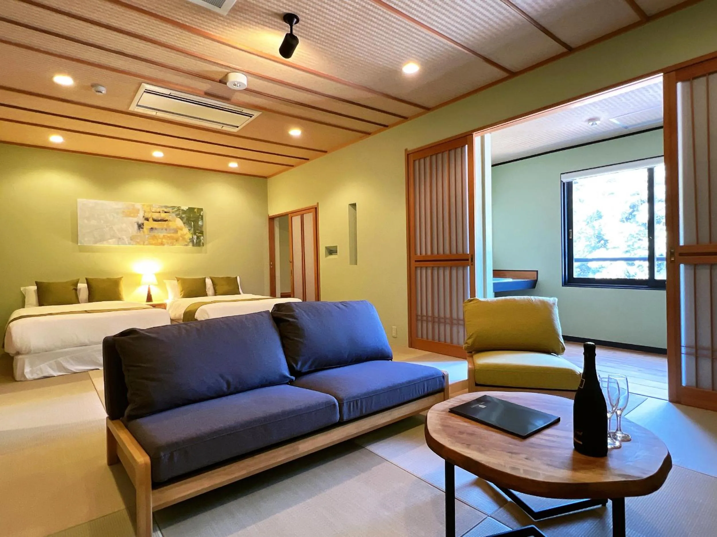 Bed in OWL RESORT ARIFUKU ONSEN