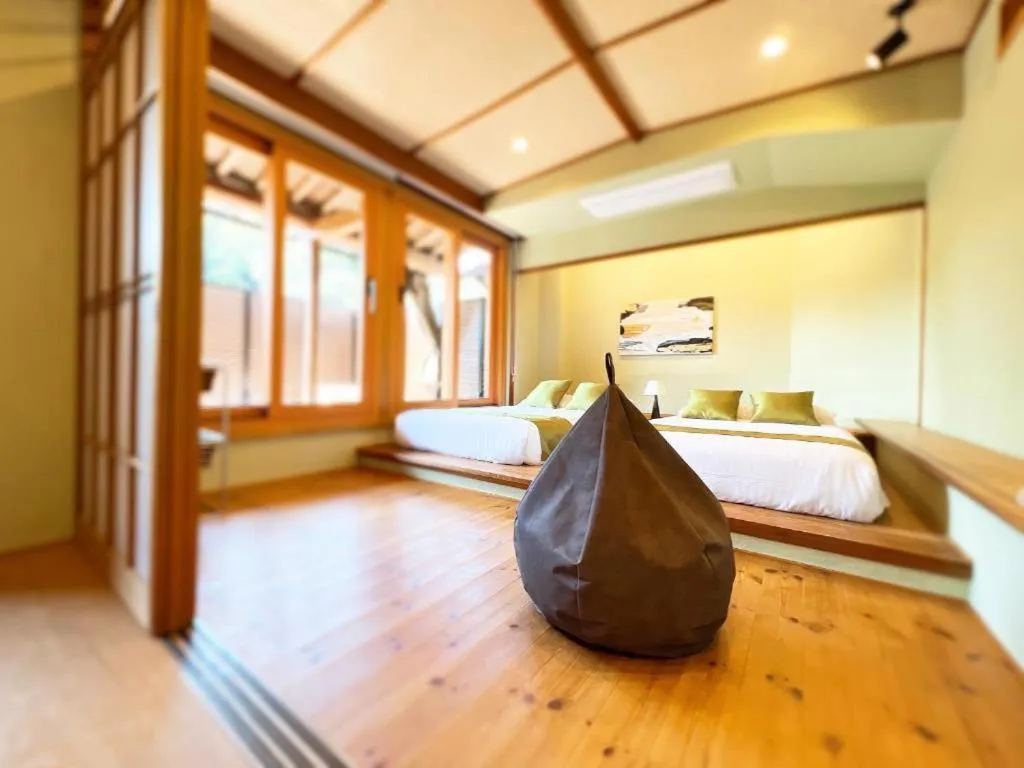 Bed in OWL RESORT ARIFUKU ONSEN