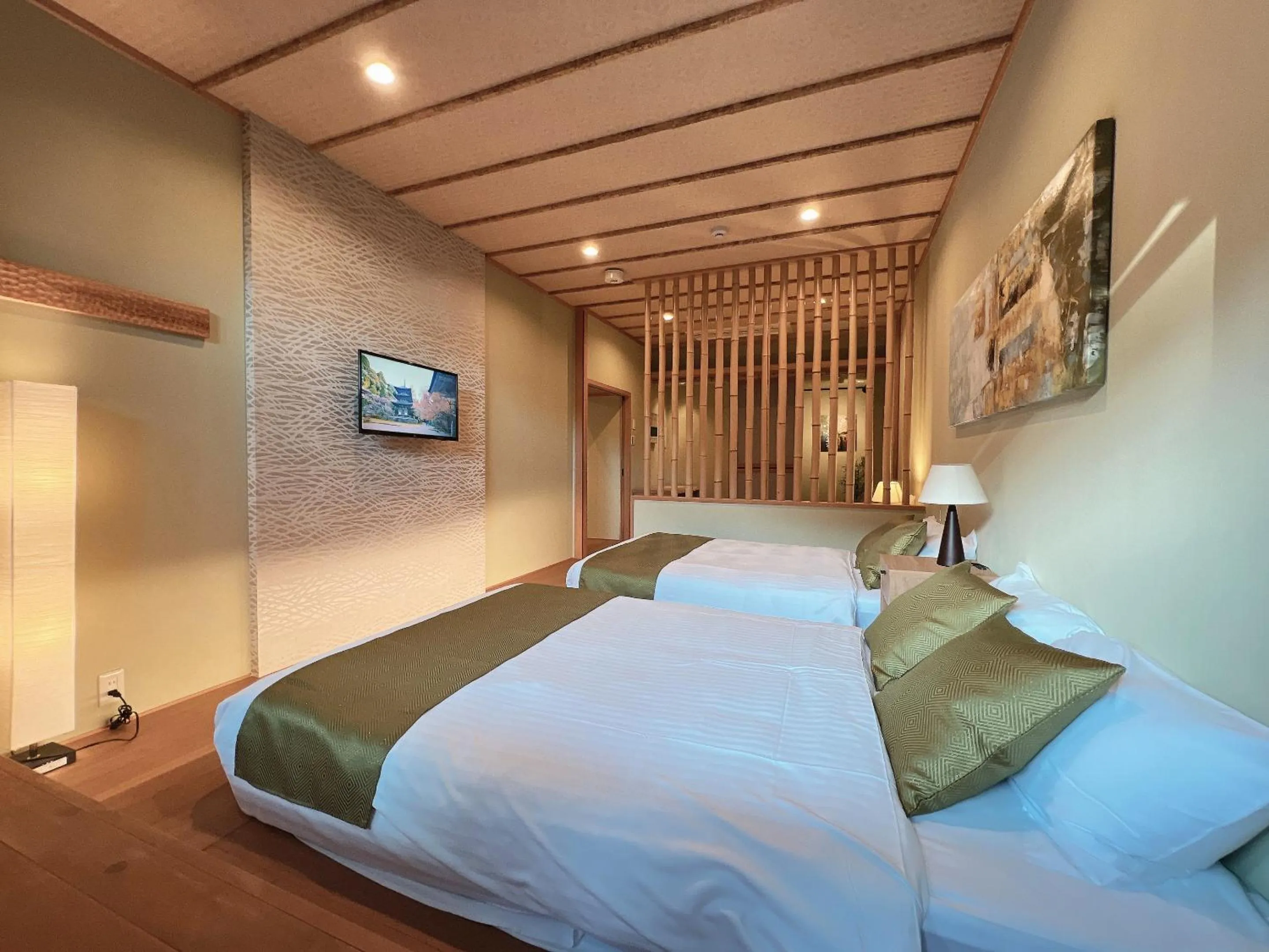 Bed in OWL RESORT ARIFUKU ONSEN