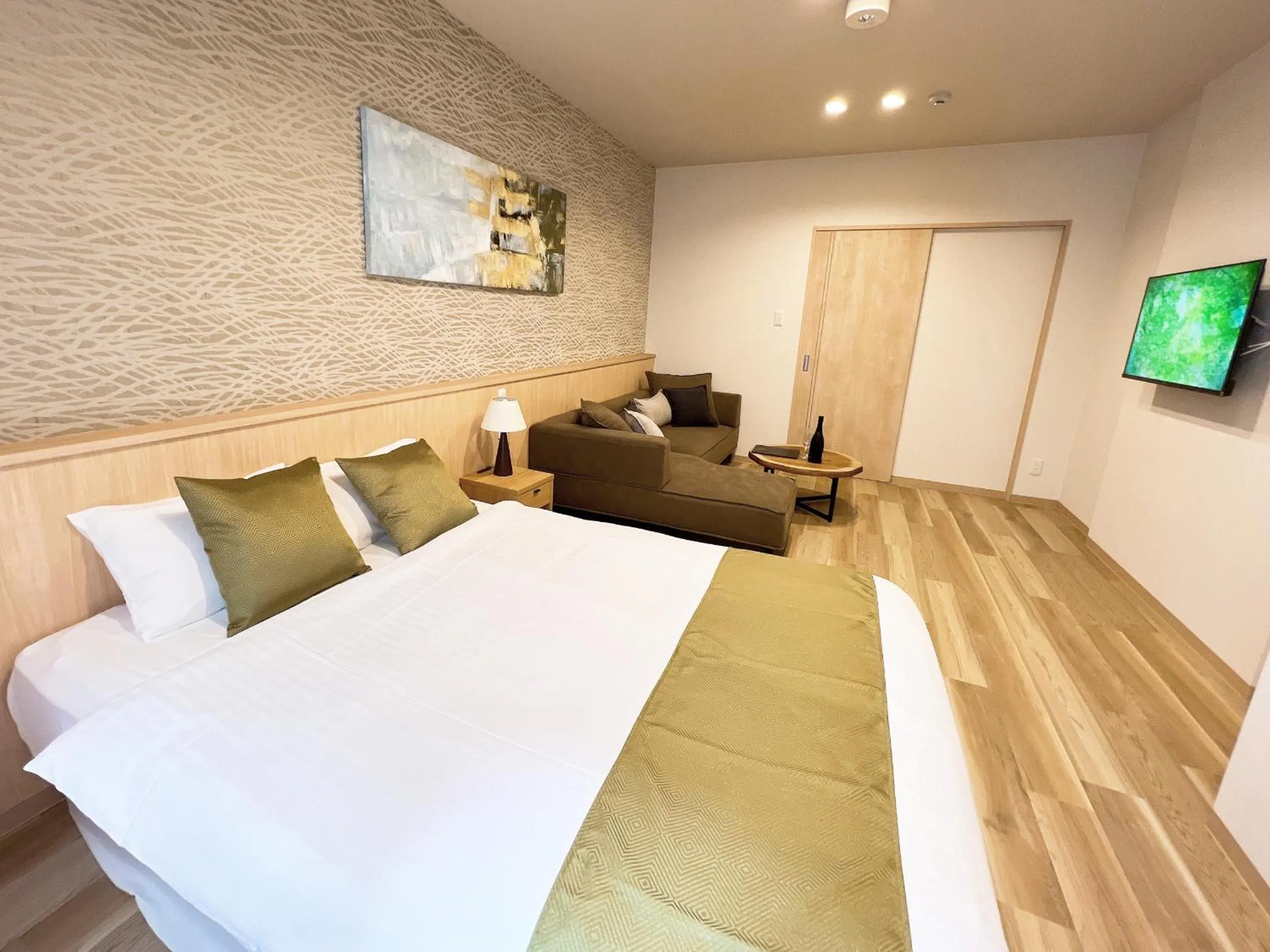 Bed in OWL RESORT ARIFUKU ONSEN