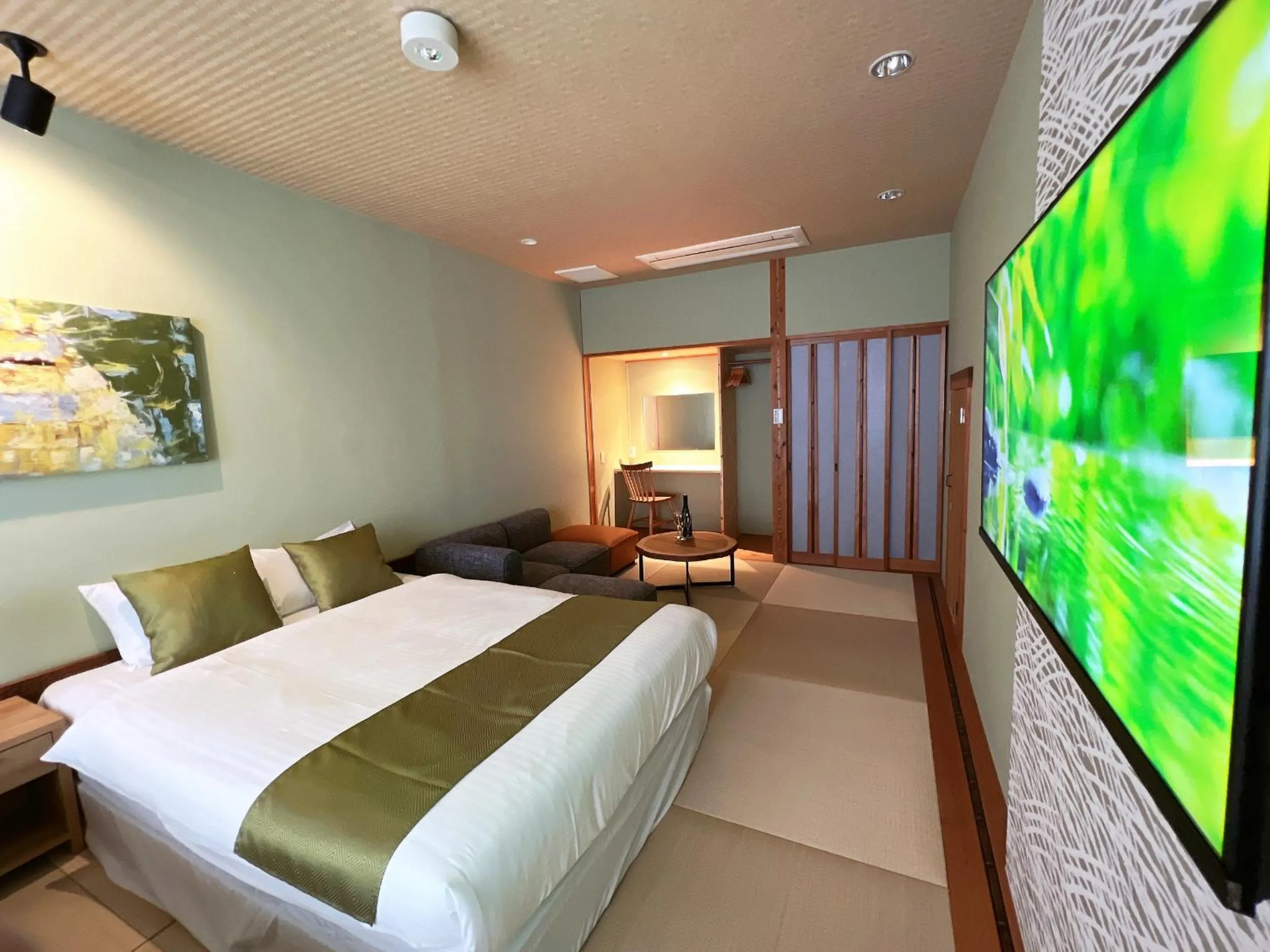 Bed in OWL RESORT ARIFUKU ONSEN