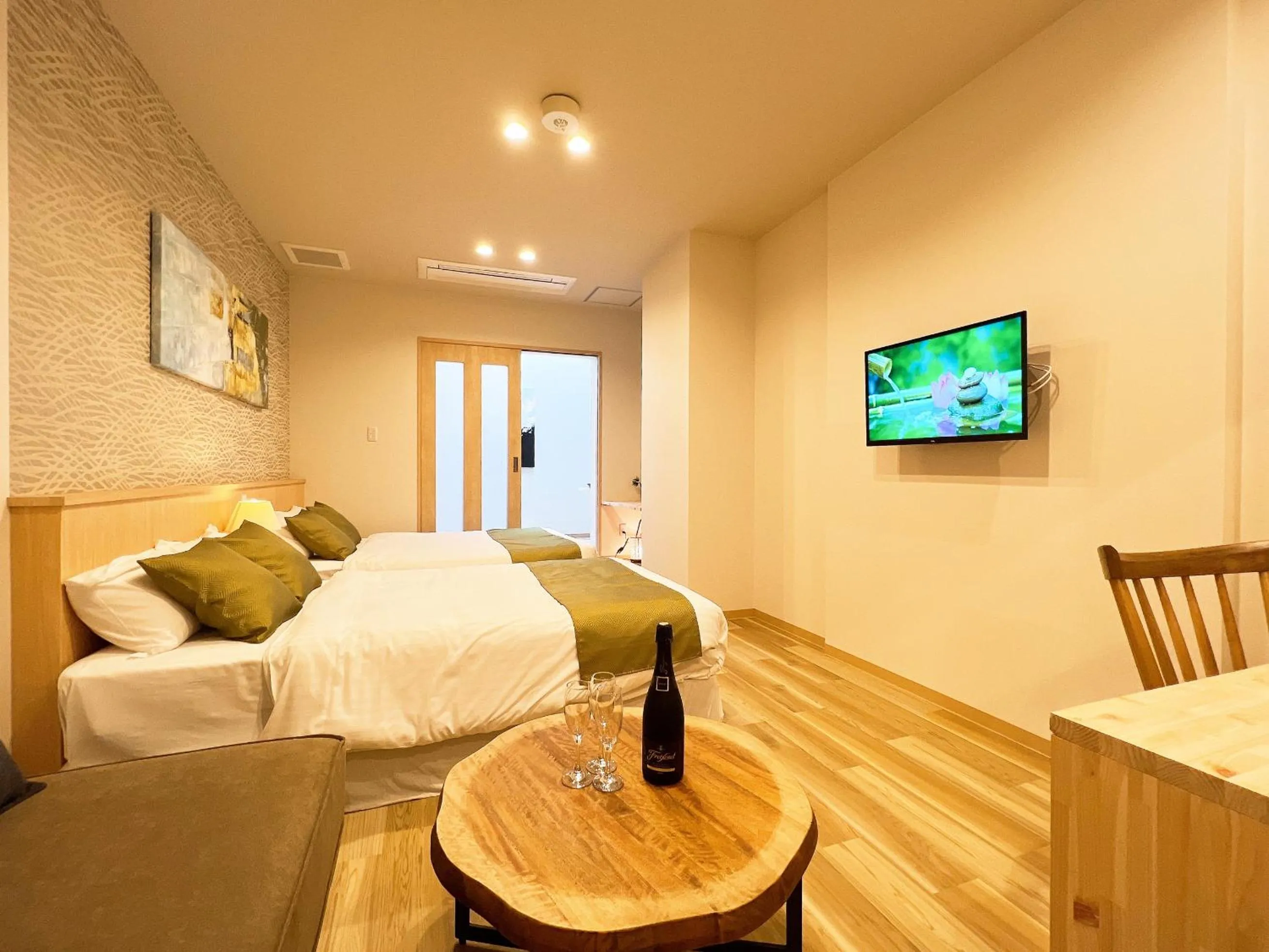 Bed in OWL RESORT ARIFUKU ONSEN