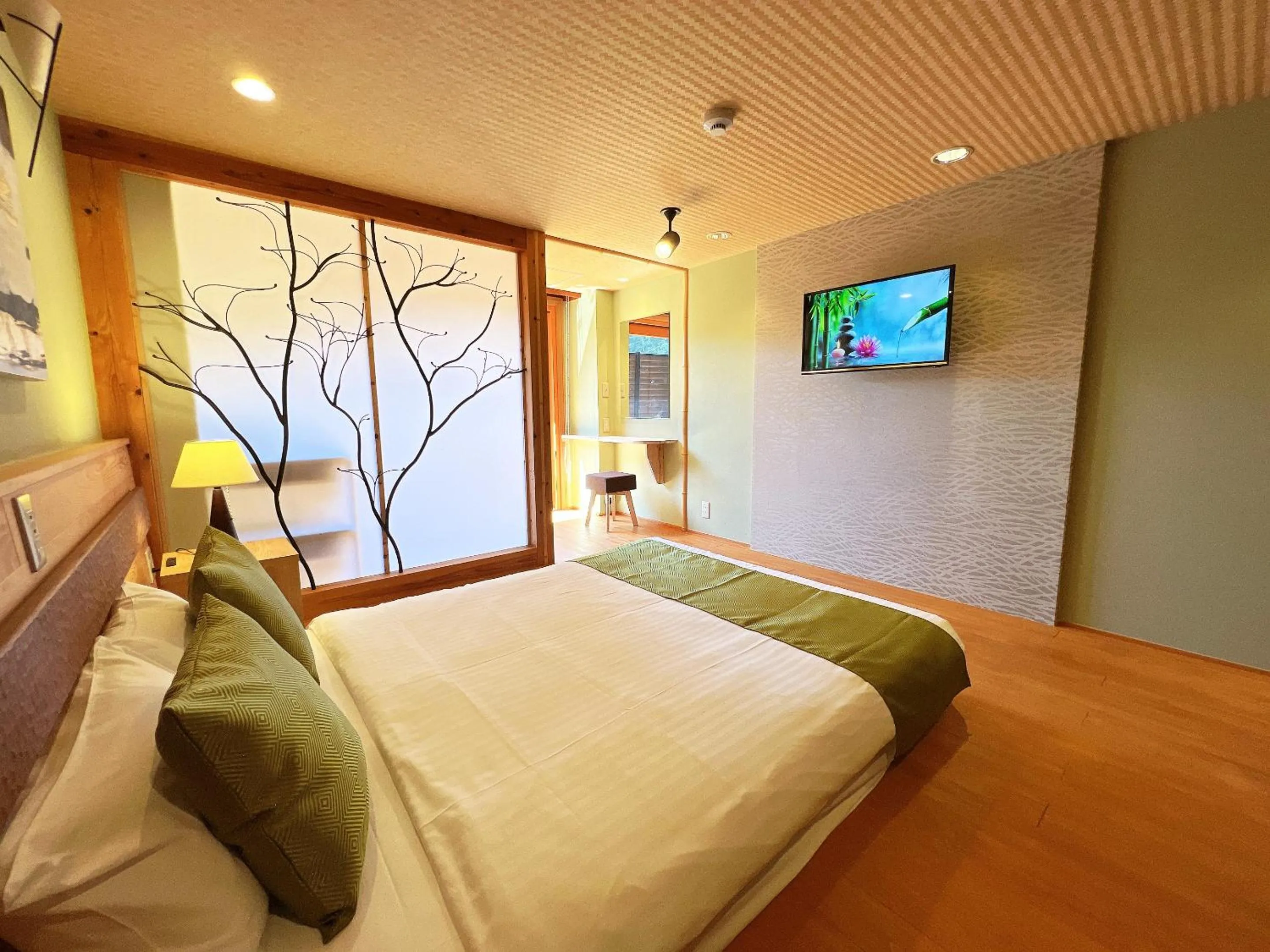 Bed in OWL RESORT ARIFUKU ONSEN