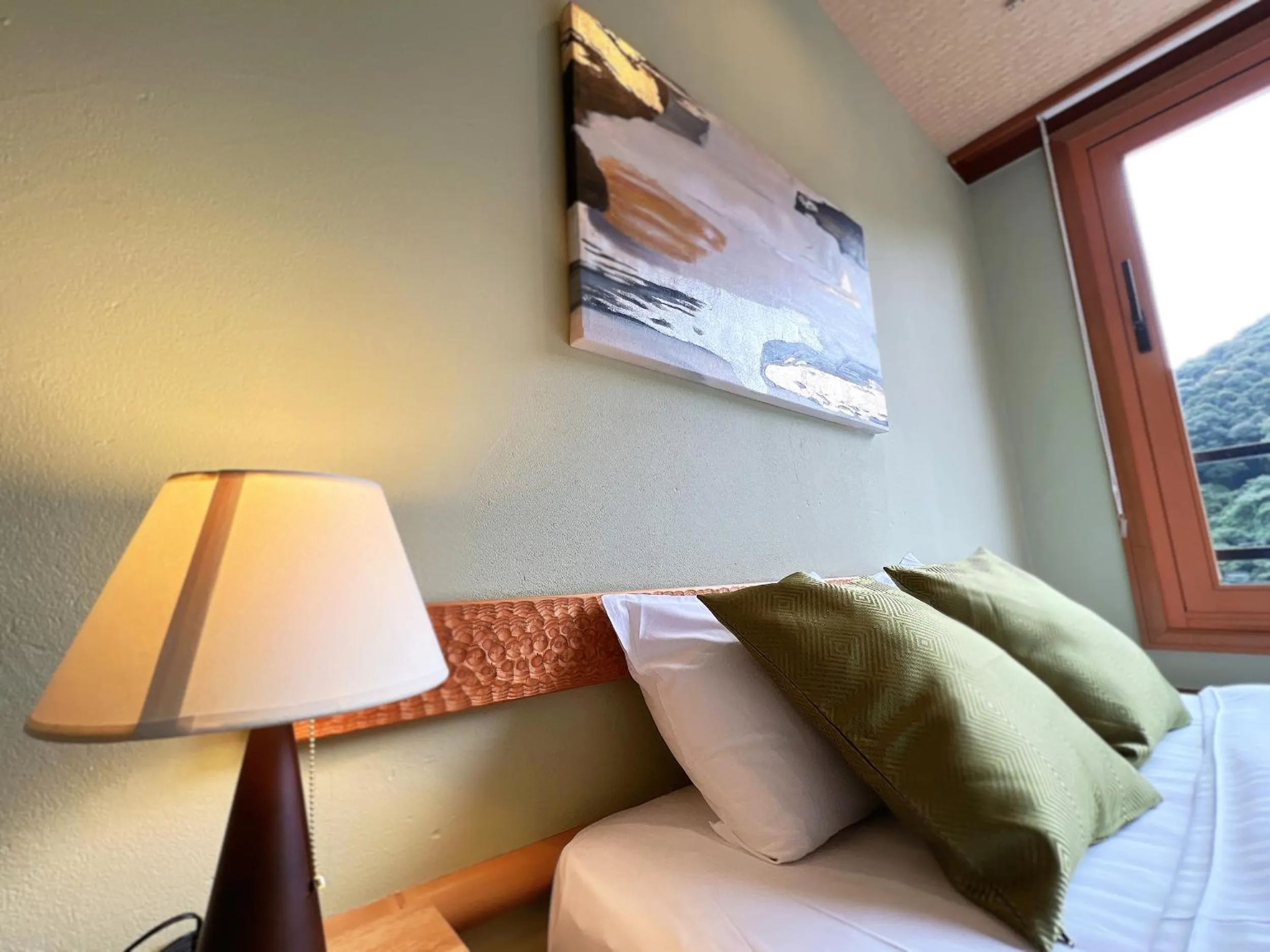 Bed in OWL RESORT ARIFUKU ONSEN