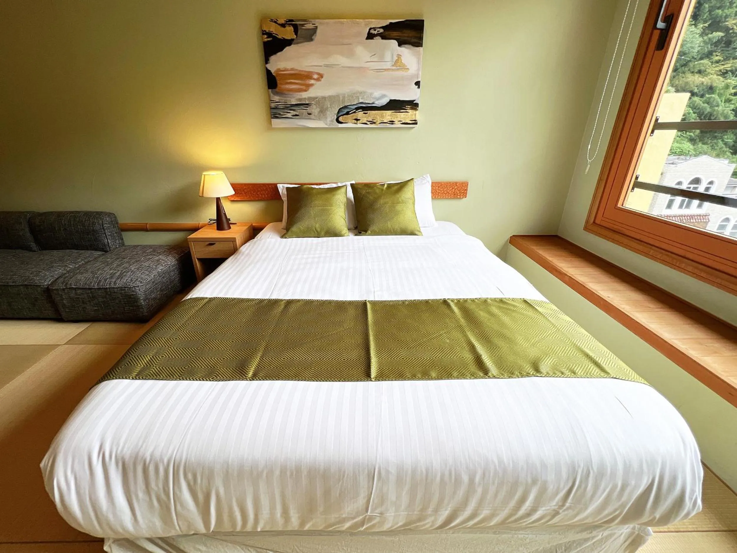 Bed in OWL RESORT ARIFUKU ONSEN