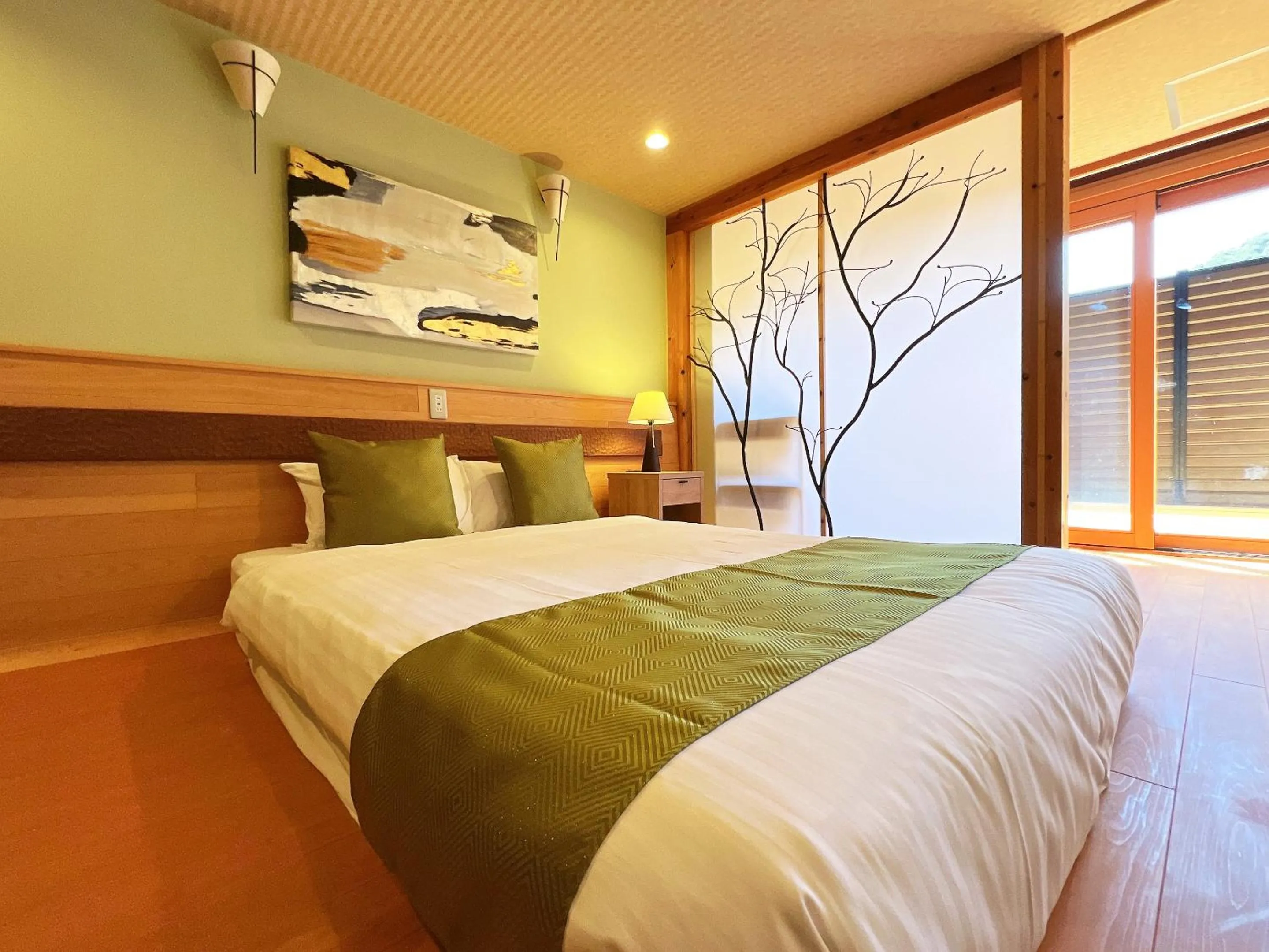 Bed in OWL RESORT ARIFUKU ONSEN