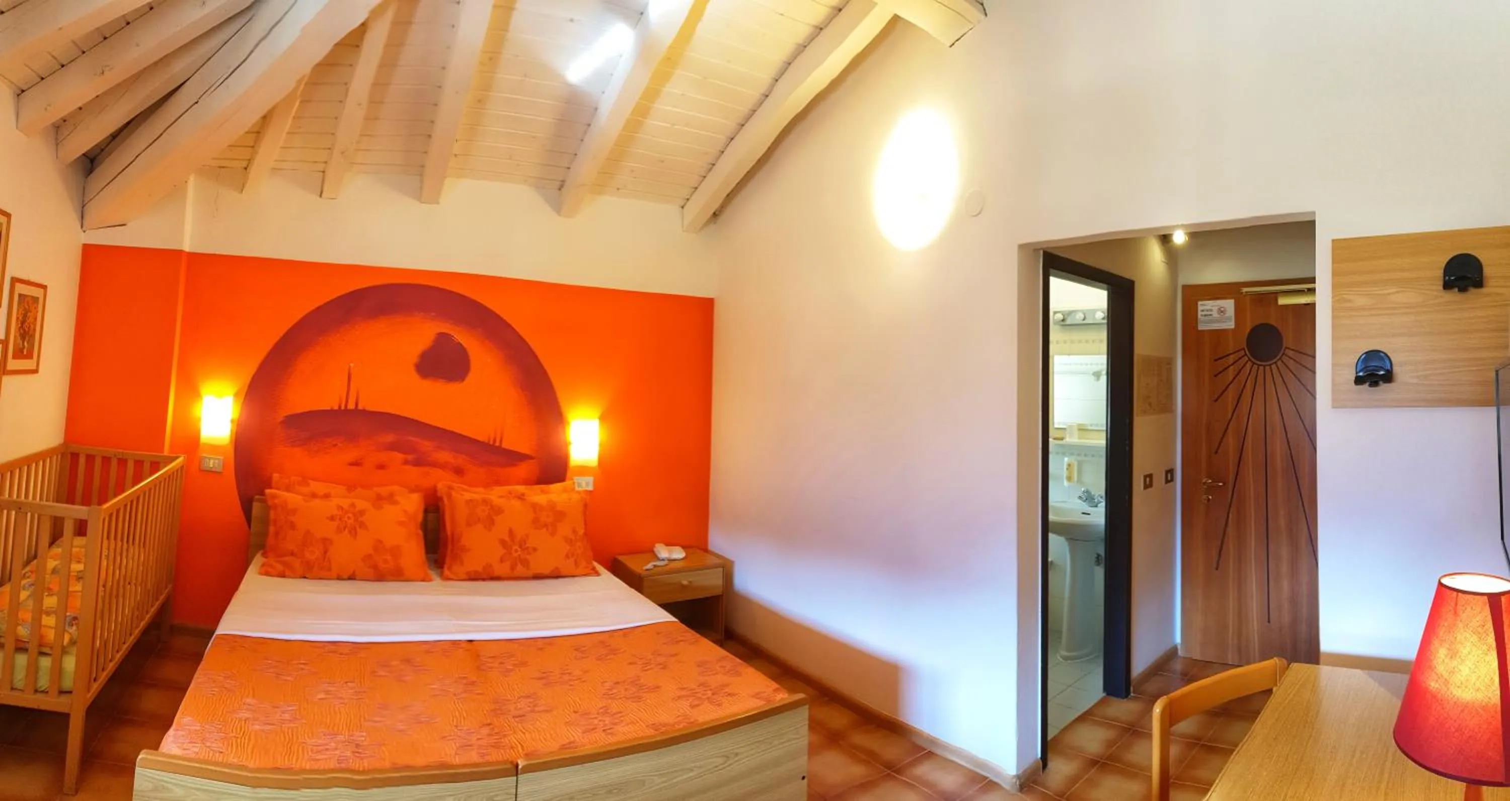 Bed in Family Hotel Primavera