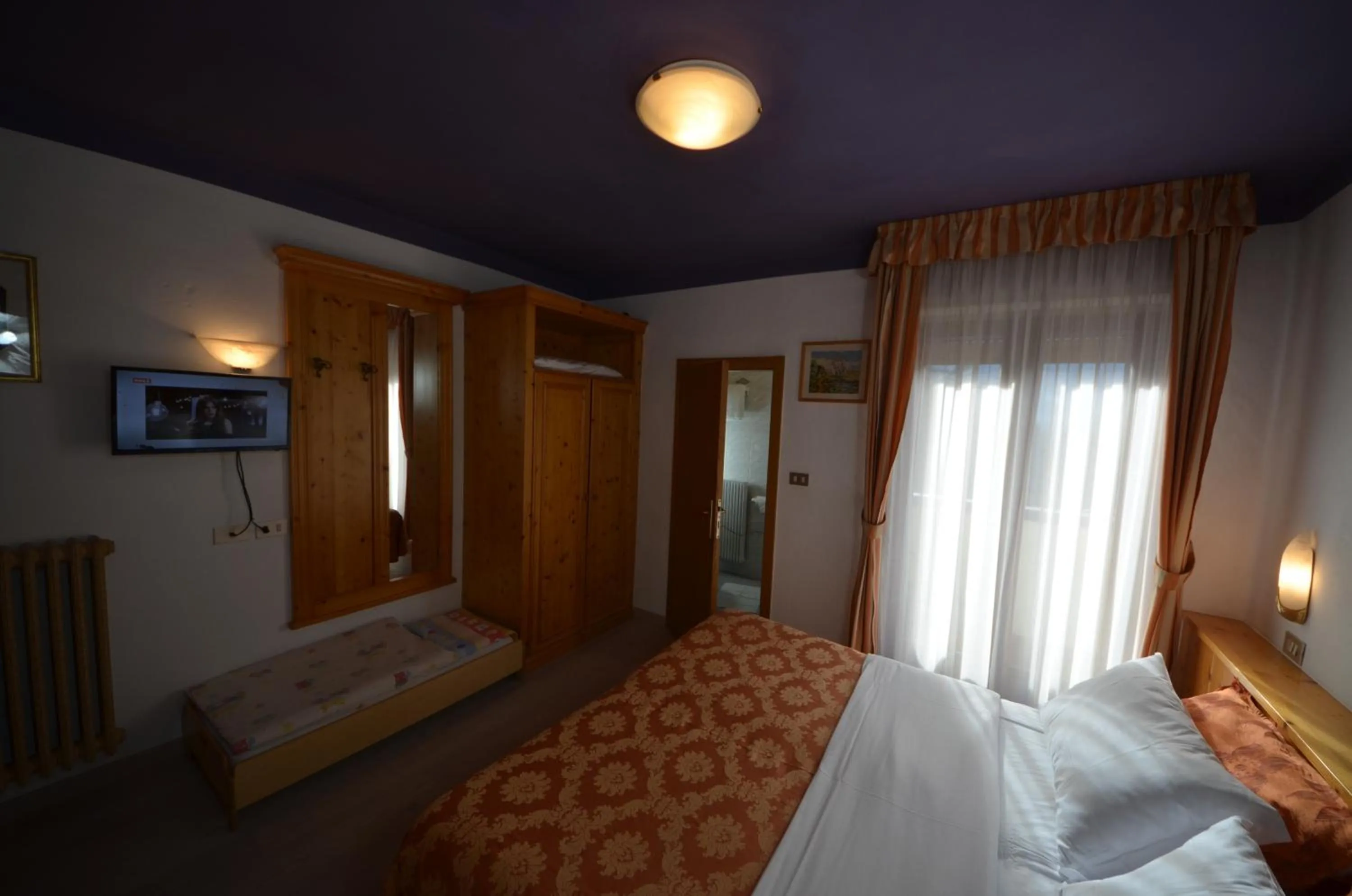 Bed in Family Hotel Primavera