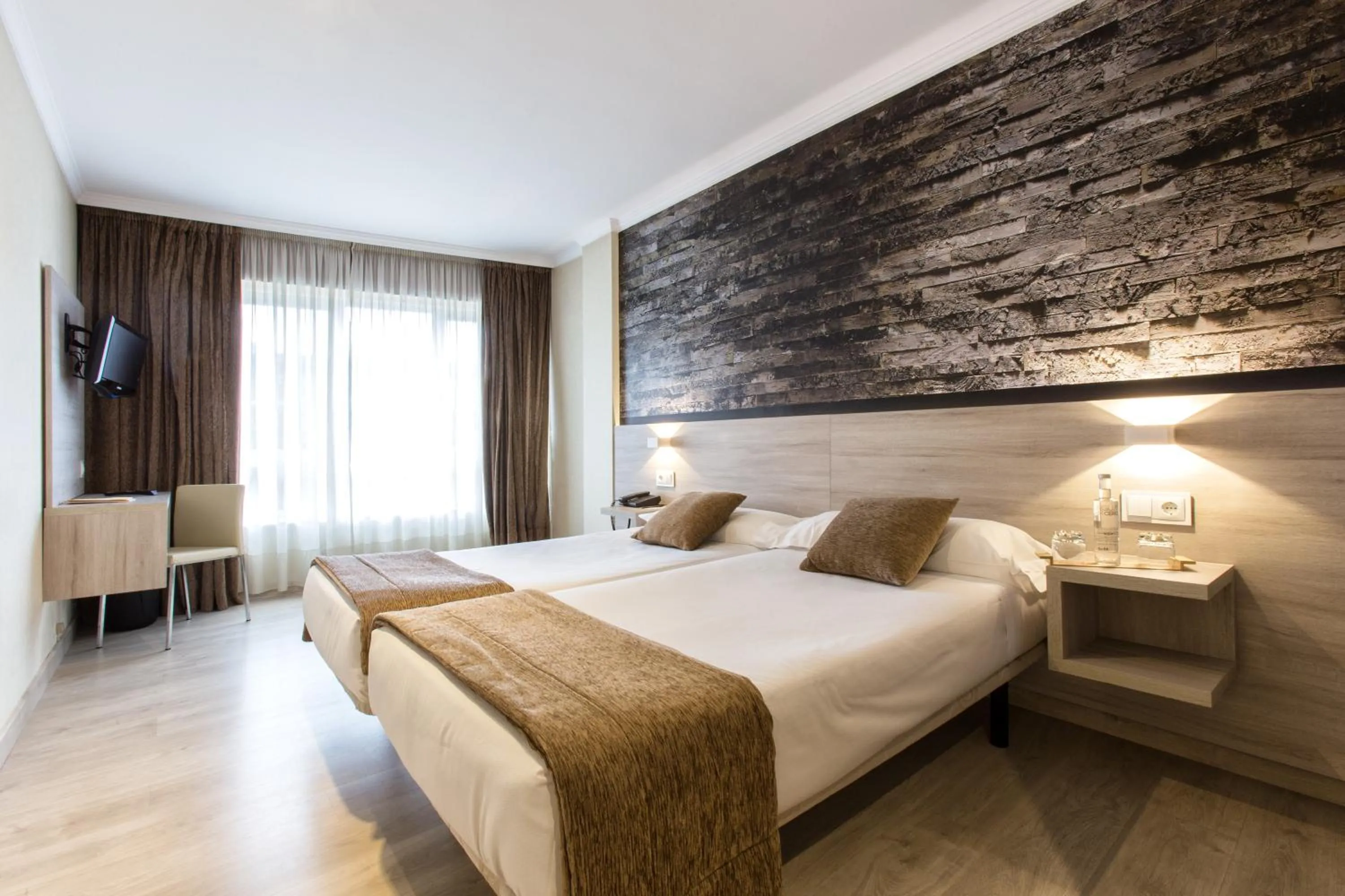 Bed in Hotel Alda San Carlos