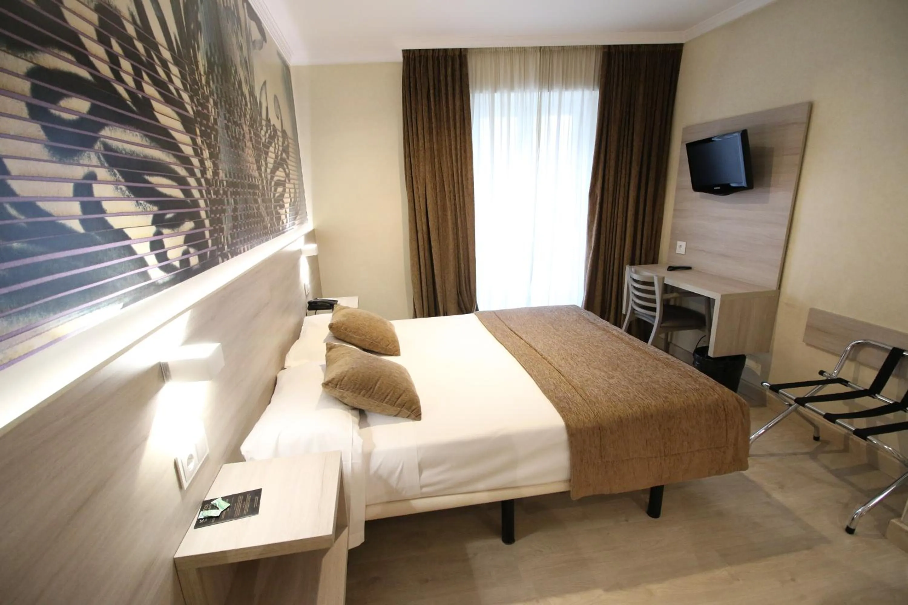 Bed in Hotel Alda San Carlos