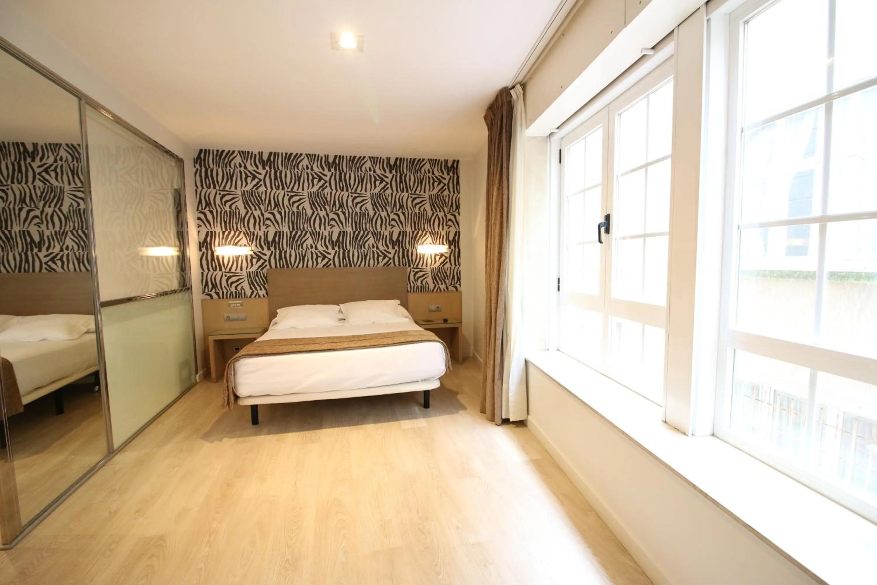 Bed in Hotel Alda San Carlos